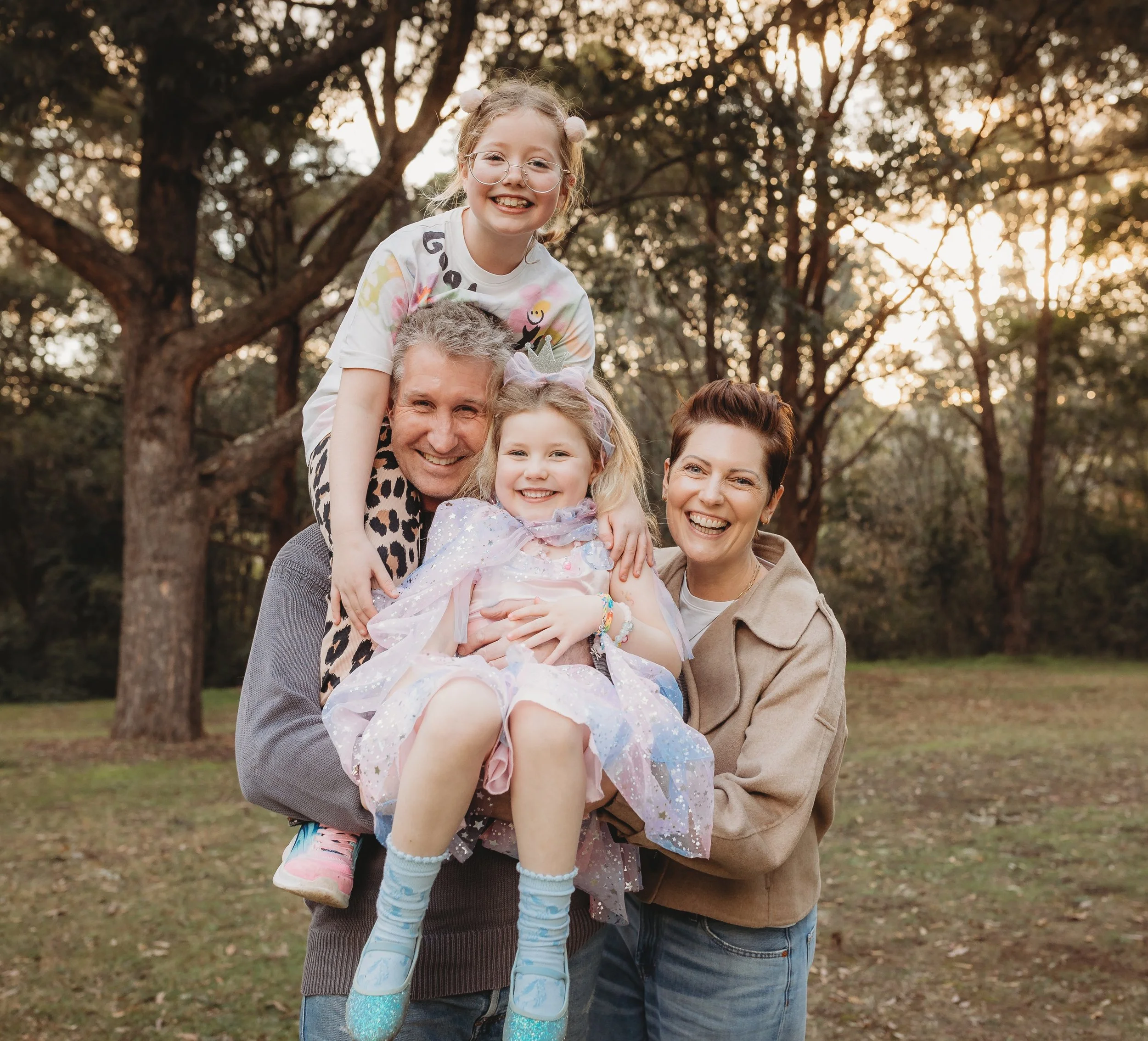 Mum had carefully picked out outfits for everyone...

The girls had other ideas. 😅

They were determined to wear their favourite dresses instead.

And you know what?

They looked absolutely adorable.

Because family photos were never meant to be abo