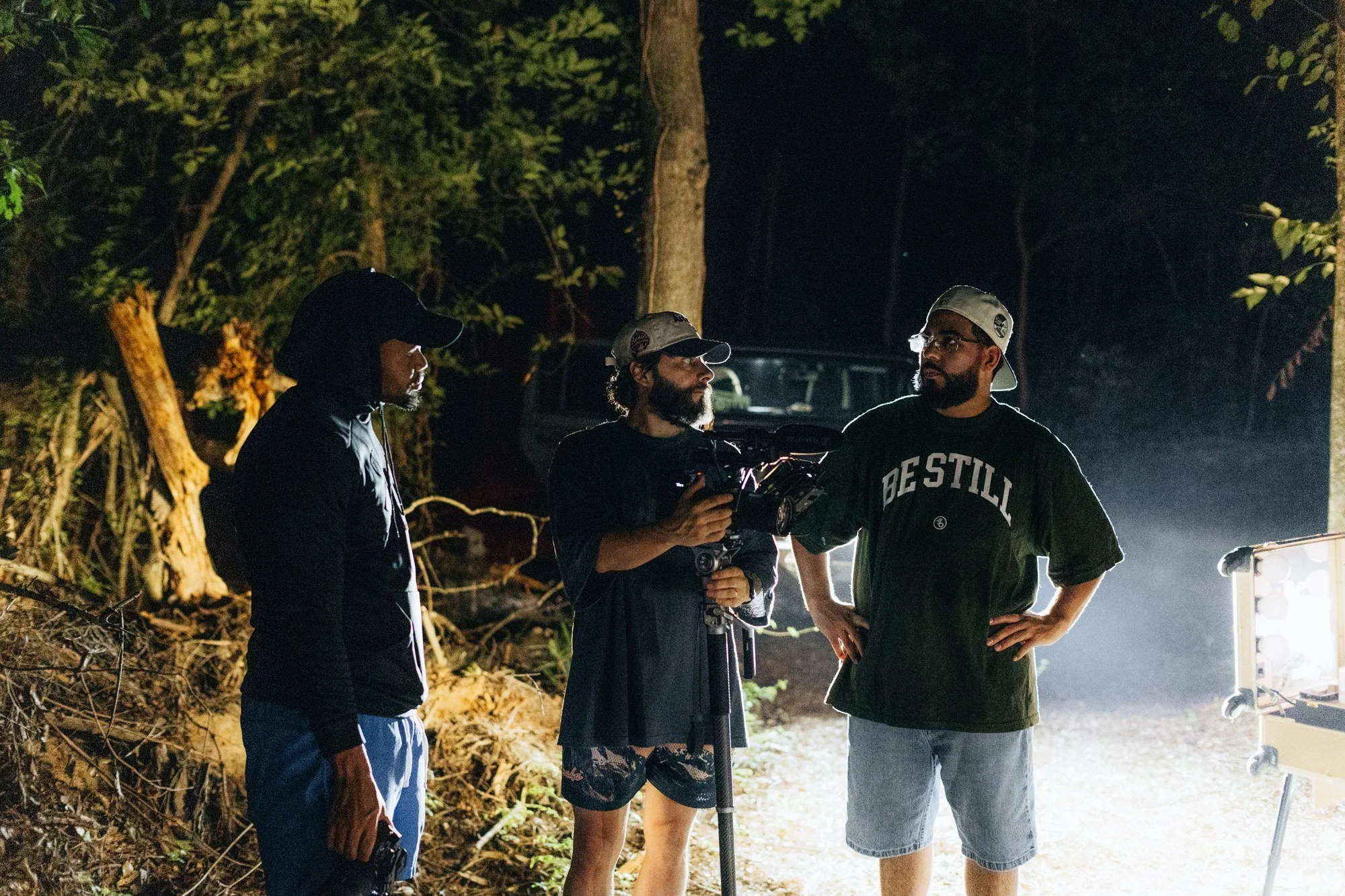 Matt Salcedo discussing a scene with the cast on location.