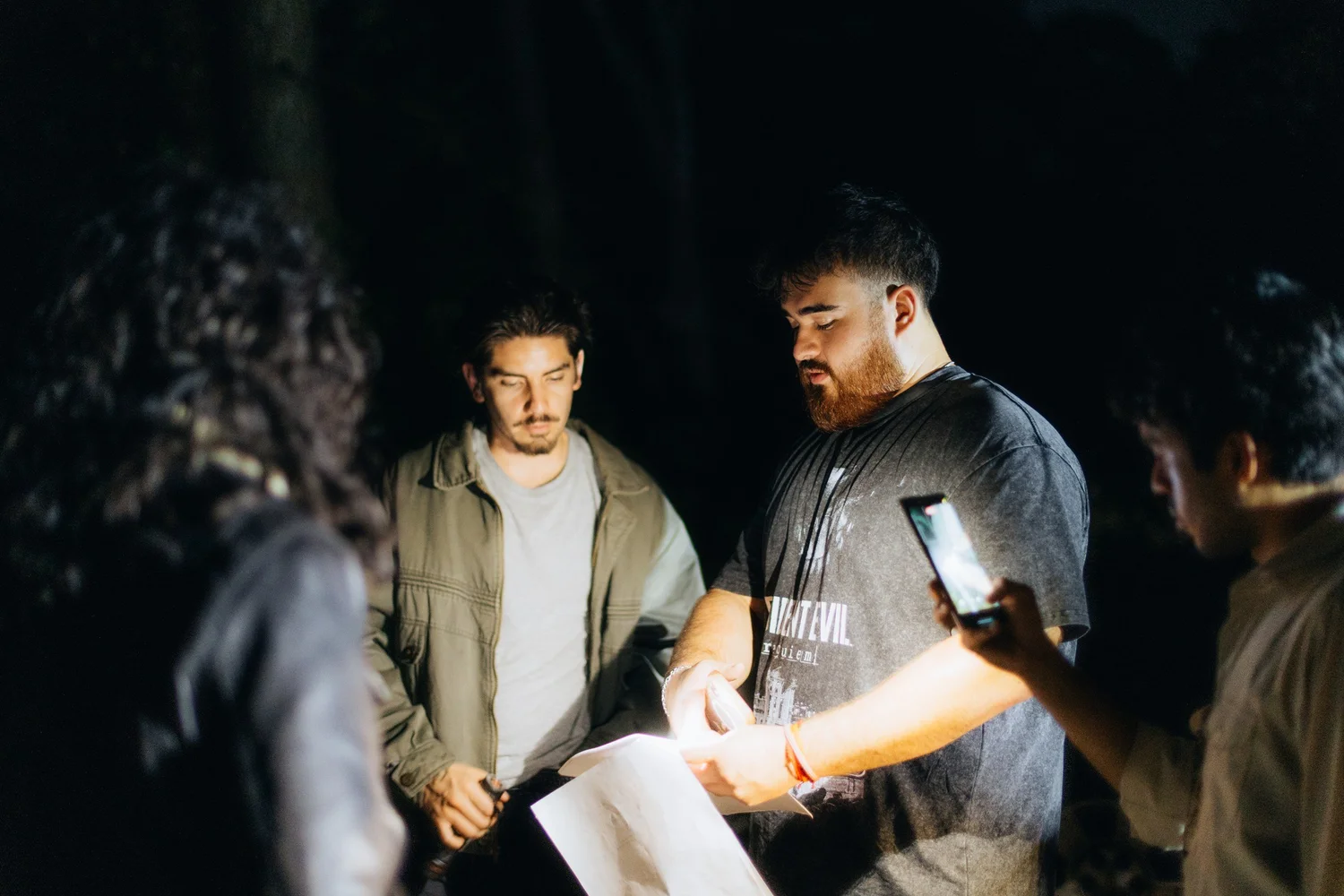Matt Salcedo reviewing a scene with the cast and crew on the Resident Evil set