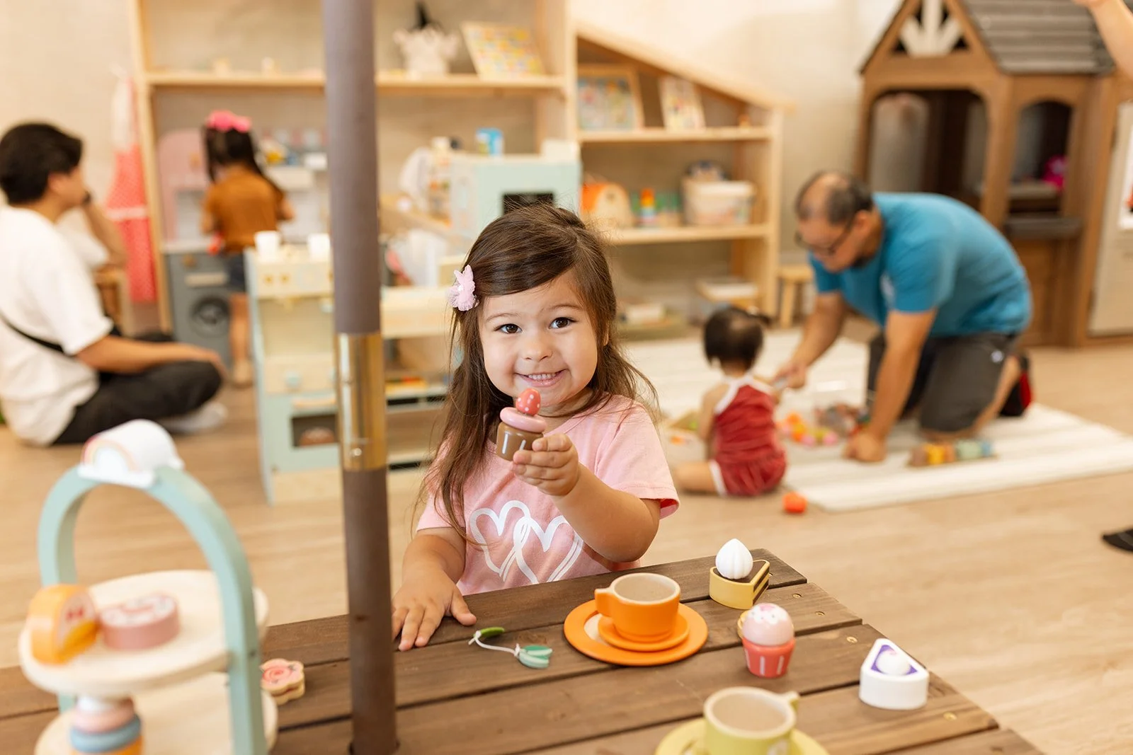 Families playing at Maeve and Rayne Play Lounge