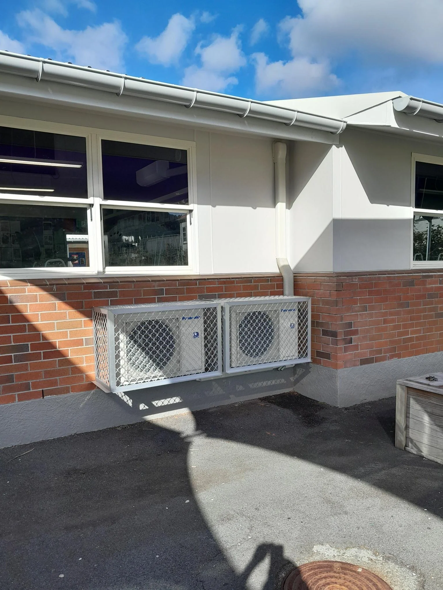 Commercial heat pump outdoor units installed at a Northland school by Breeze Northland
