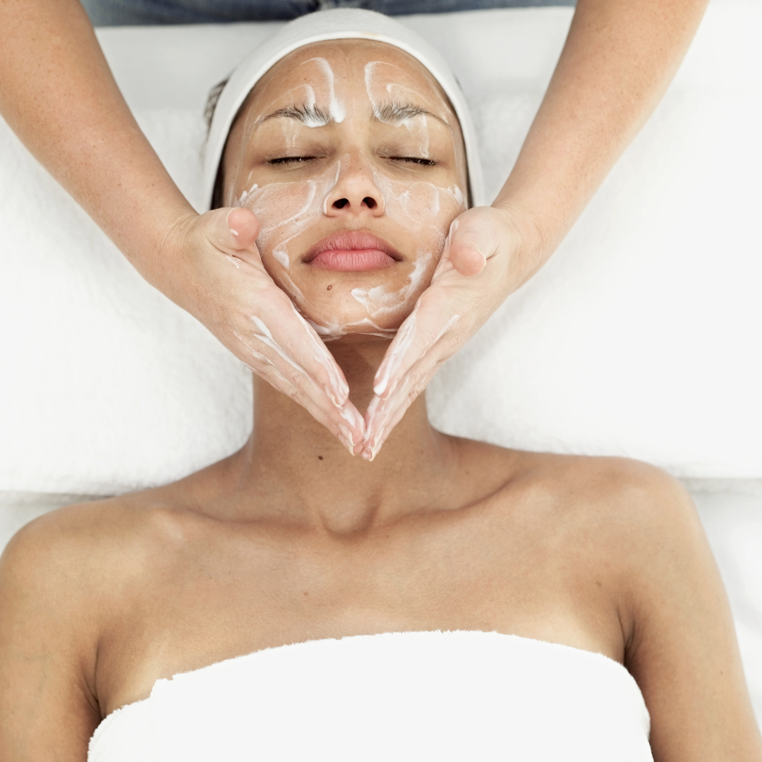 Woman laying down receiving a facial