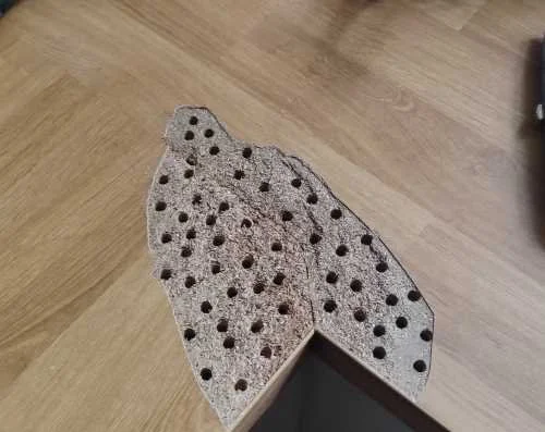 We have surgically removed the water damage from the surface and drilled holes for mechanical adhesion