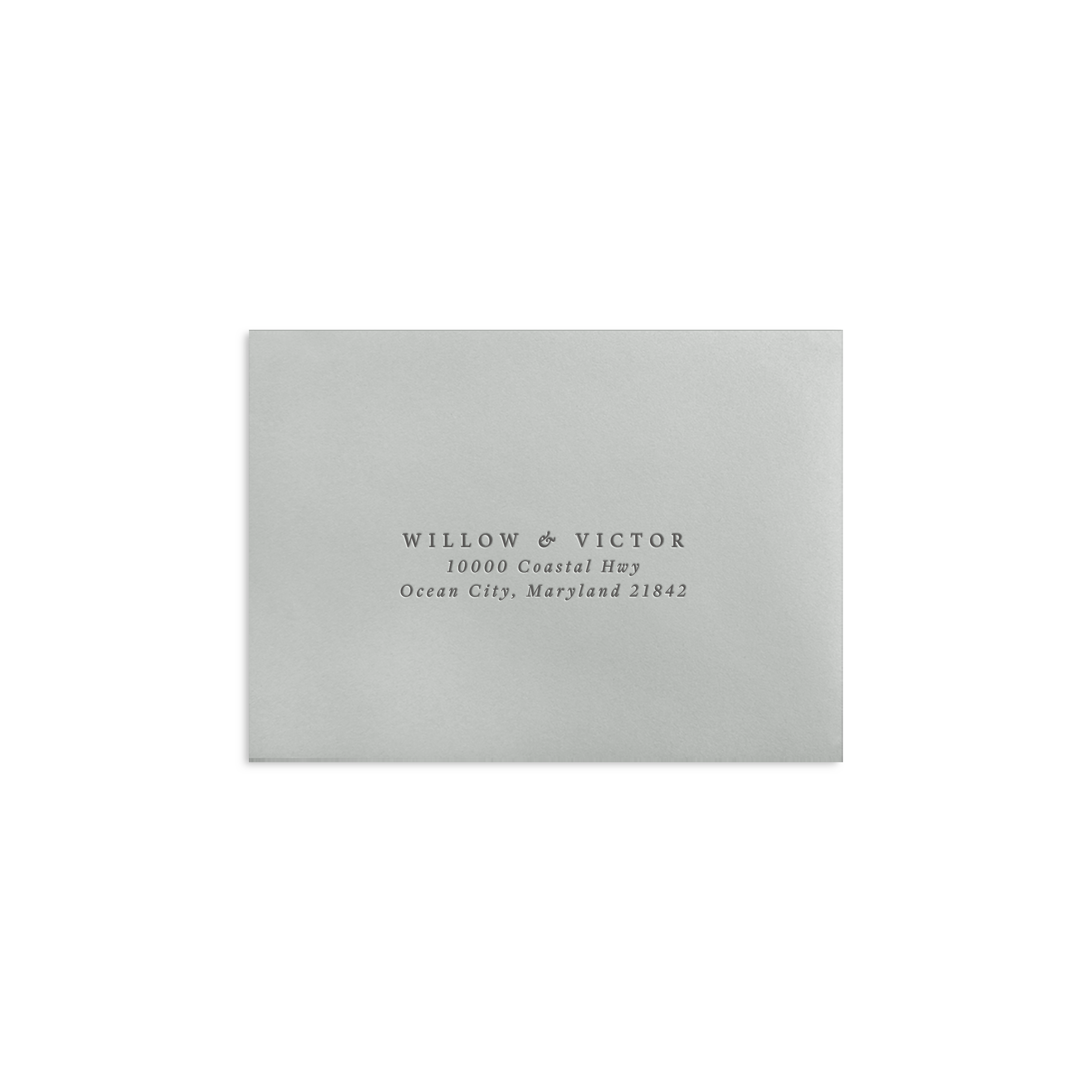 Website2023_ModesteReturnAddressonReplyEnvelopeMockup_Letterpress.png