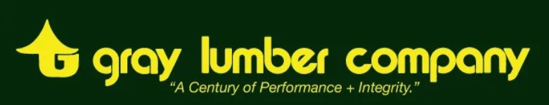 Gray Lumber Company logo with green background and yellow text, including a tree design.