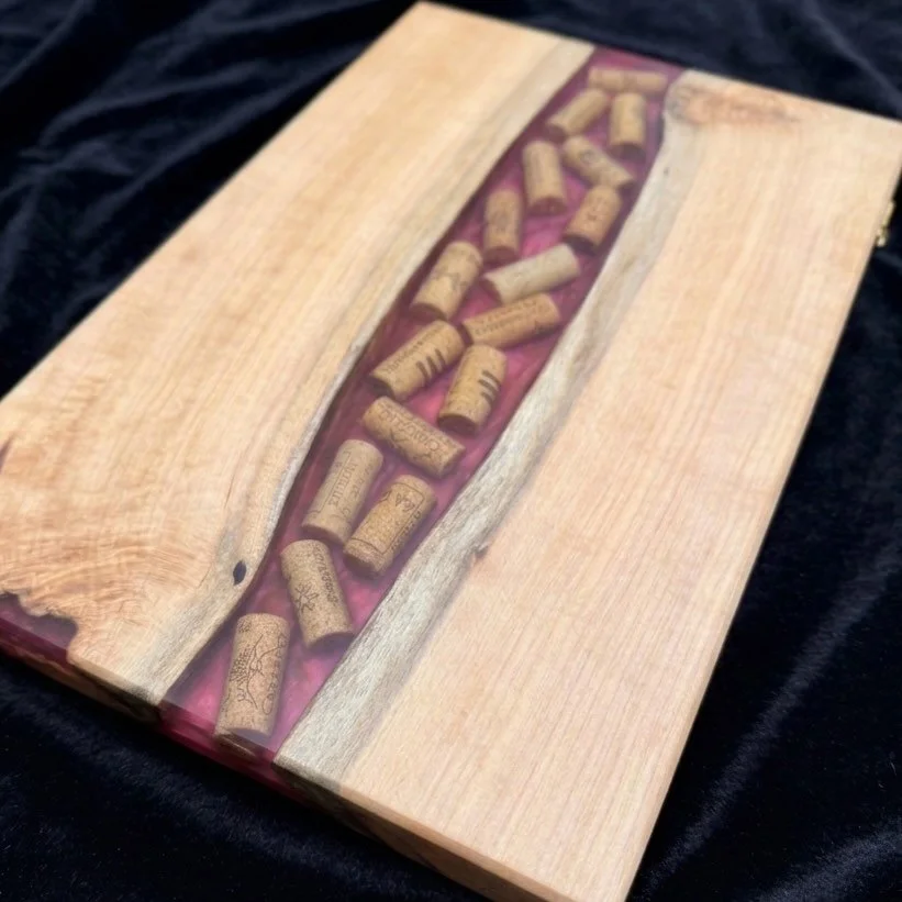 I got asked to create a platter, using some corks from a couples trip to Italy!

#woodworking #charcuterieboard #woodworks #epoxy #wine