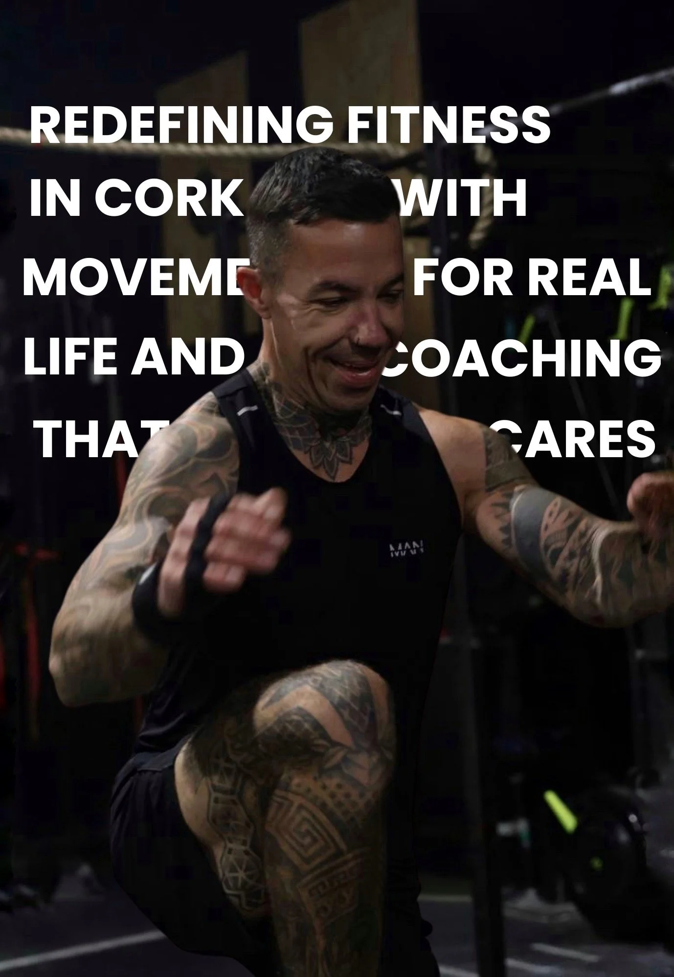 A man with tattoos on his arms and legs smiling while exercising in a gym, with white text overlay promoting fitness coaching.