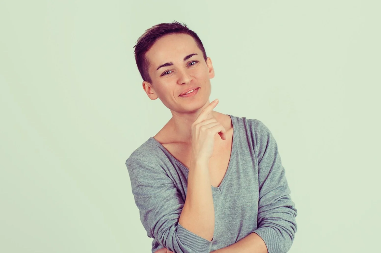 A smiling trans person