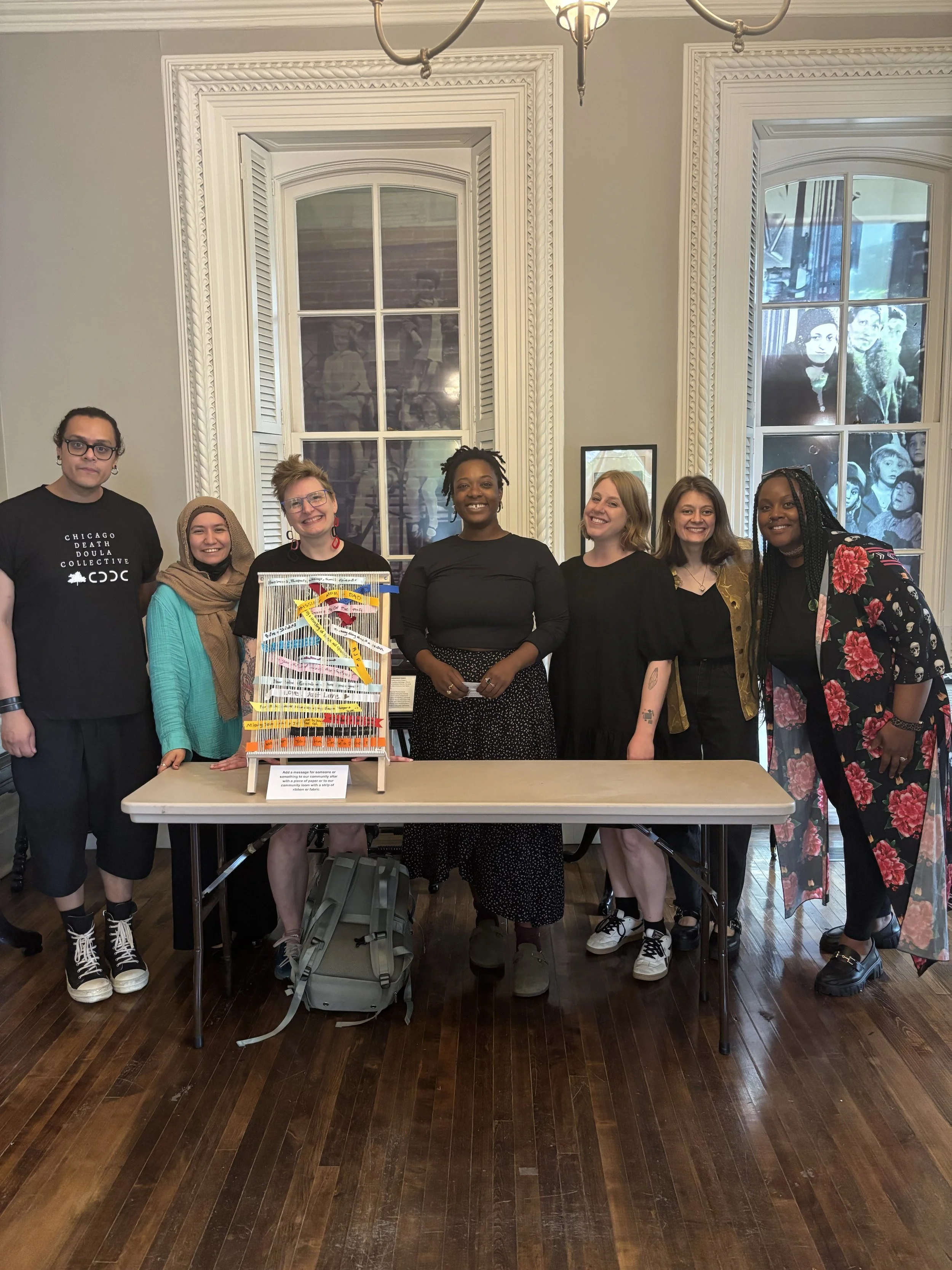 7 people posing for a photo