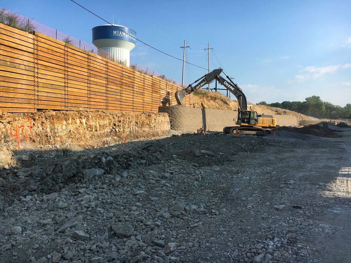 Construction of beam and lagging and keystone wall in Miamisburg, OH
