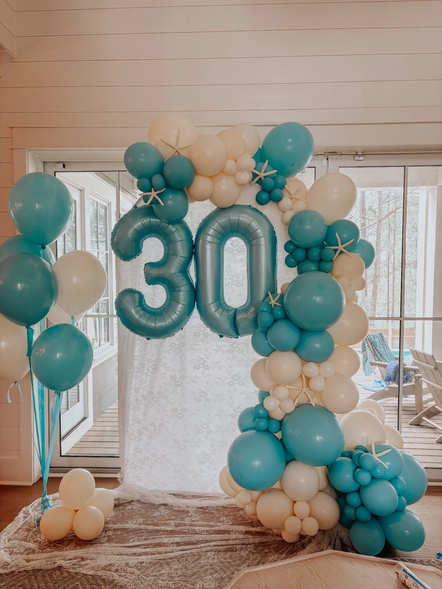 Thirty looks pretty good in coastal blue 🌊

This setup was designed to feel fun, elevated, and perfectly beachy without overpowering the space. The soft blues, creams, and oversized numbers created the perfect balance for a birthday weekend along 30