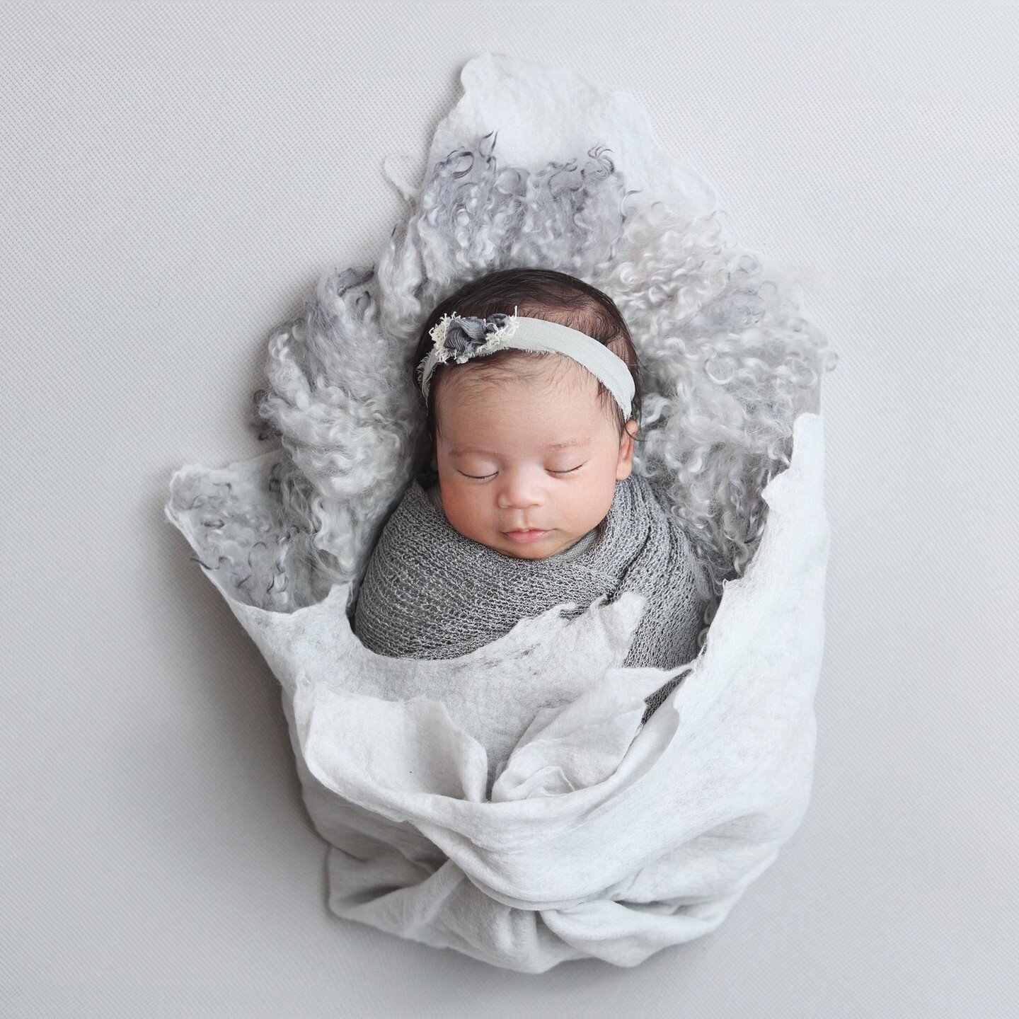 So beautiful is this baby photographed by our associate Renata. Need a newborn session? Our associates are trained with the best lighting and props on thr market. In studio or in home. Visit the website to book. We work with the tinest humans on the 