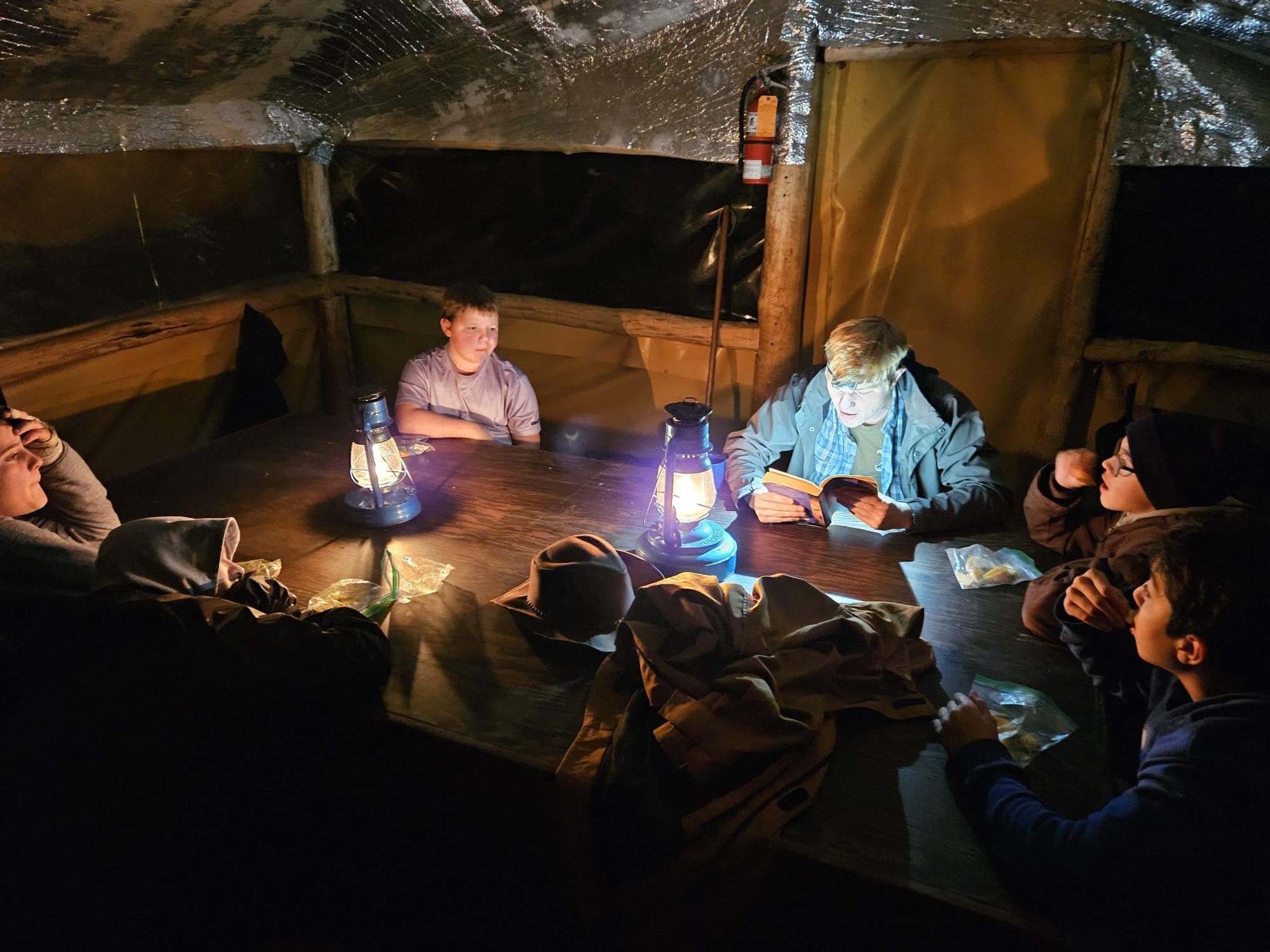 reading in chuck tent.jpg