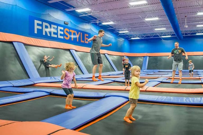 Kids jumping at the trampoline park Skyzone.