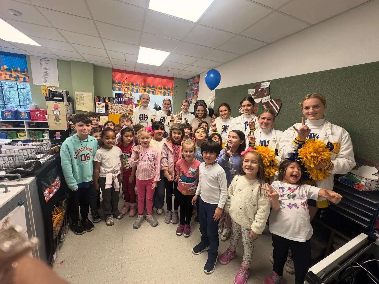 VP of Allocations, Christy Hinchey, along with the AHHS Mule drumline and cheerleaders visited 30 classrooms/ offices to awarded the Fall Curriculum &amp; Enrichment Grants that will be funded by the PTO. In total, PTO provided more than $80,000 that