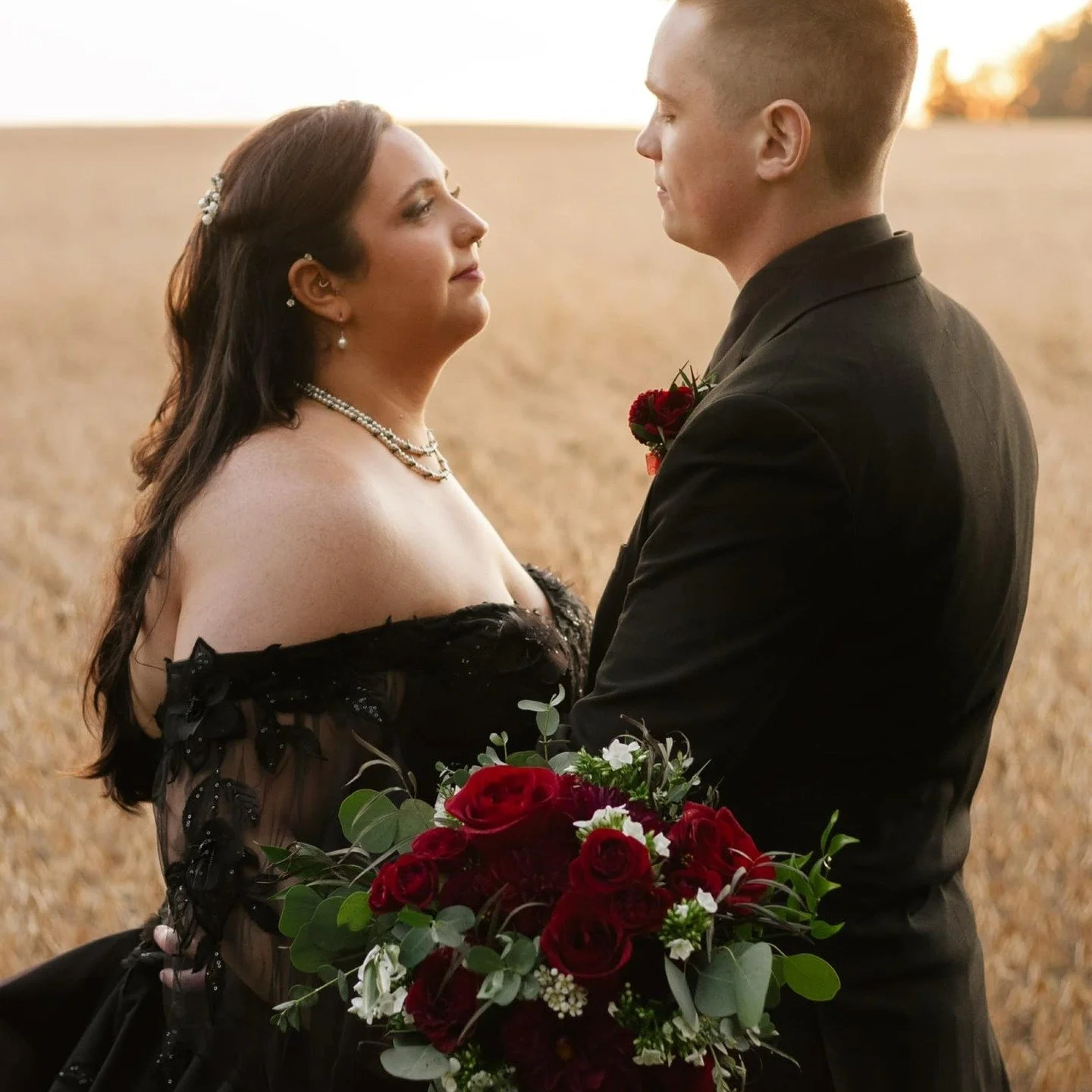 🍂✨ Madyson &amp; Zak&rsquo;s Fall Wedding at Country Coach House, Burlington, IL! Their black &amp; red theme looked amazing in our rustic barn setting. Close to home, yet tucked into the countryside&mdash;perfect for that classic barn wedding feel.