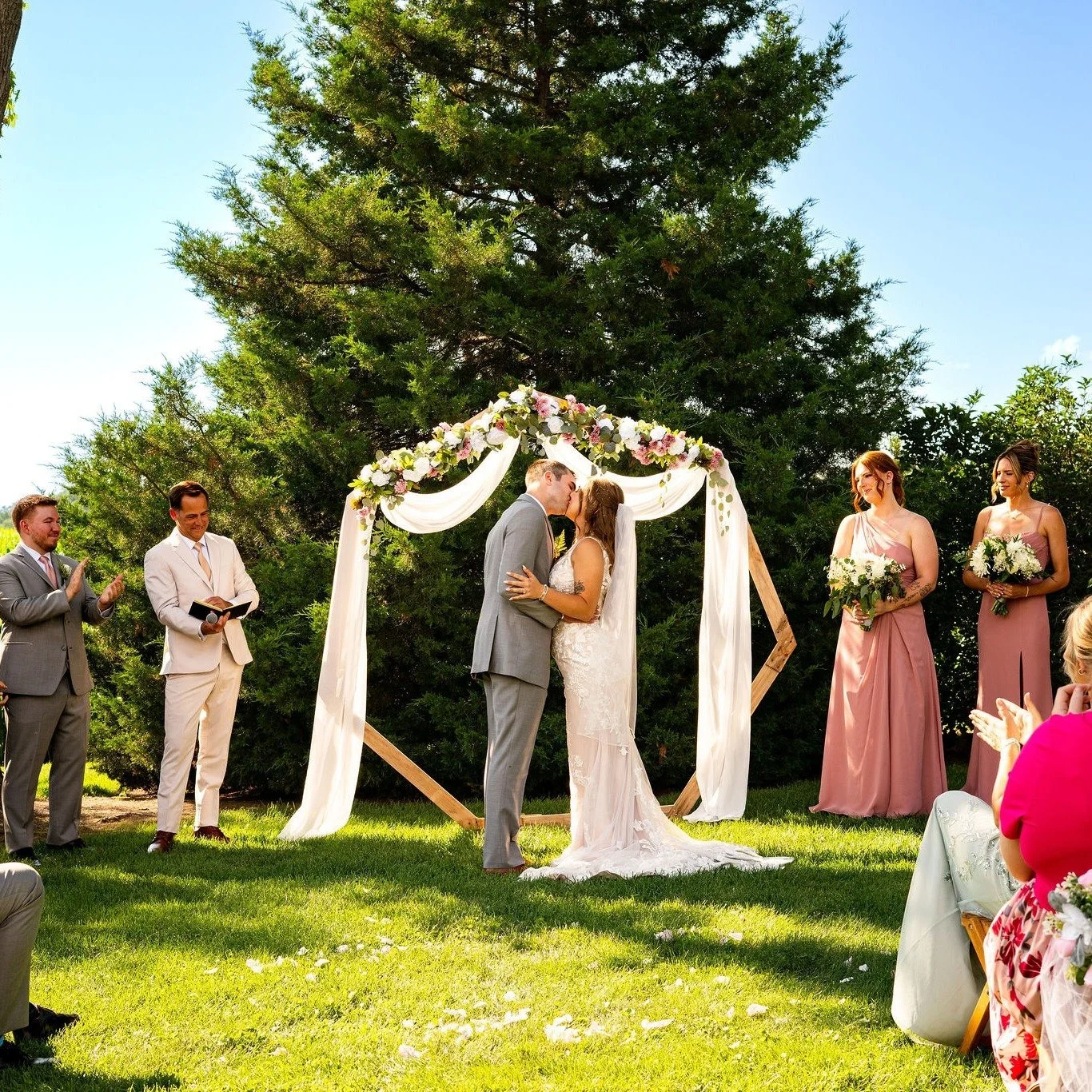 It's all in the little details! 🤍🌿

Melanie &amp; Michael's wedding was filled with beautiful personal touches, vintage charm, and a sweet ending!

Our heptagon arbor was dressed in flowing white fabric and florals, creating a beautiful backdrop fo
