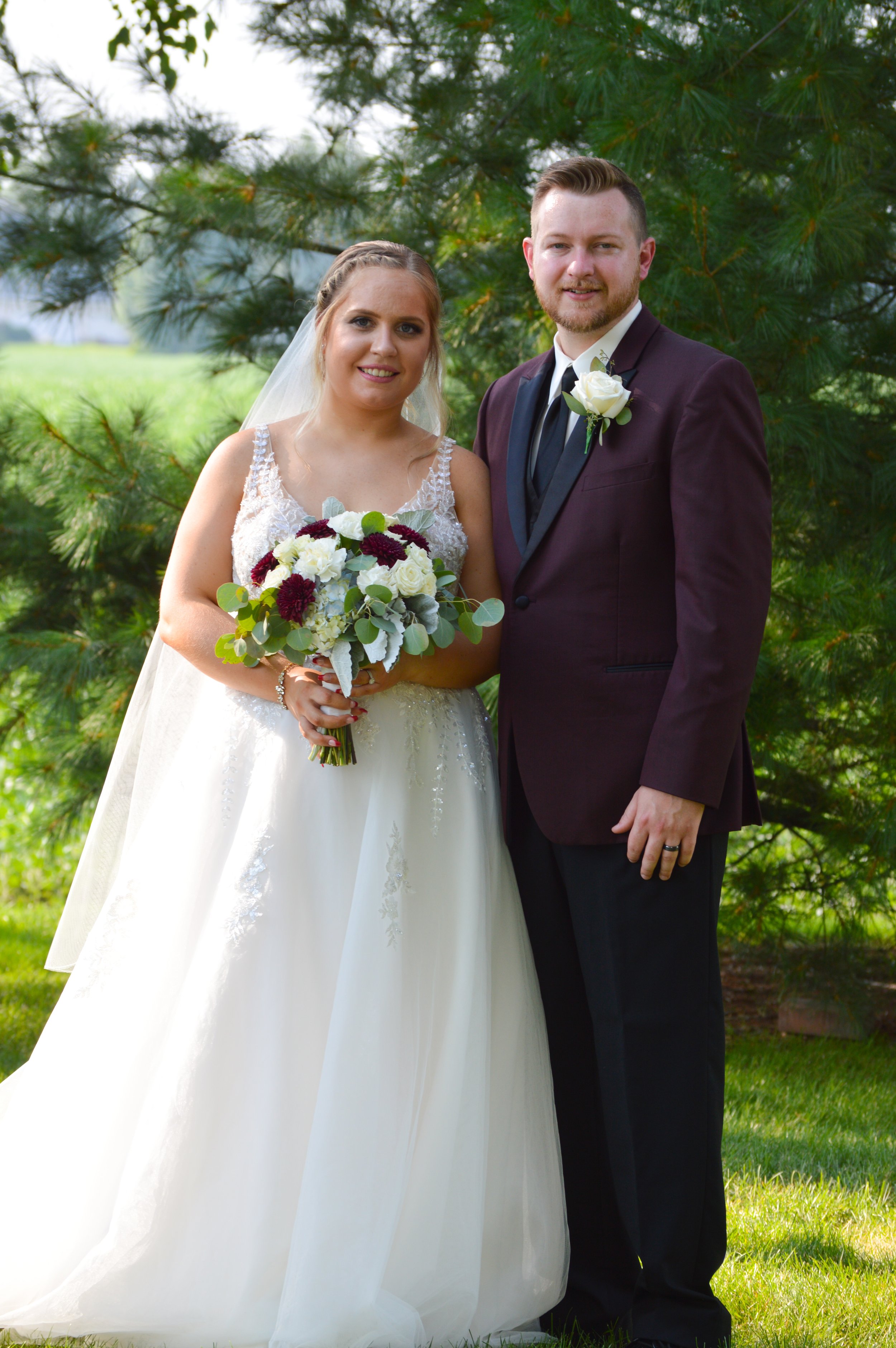 Portrait of a bride and groom with natural green surroundings at Country Coach House, Burlington, IL.  Ryan Latimer Photography