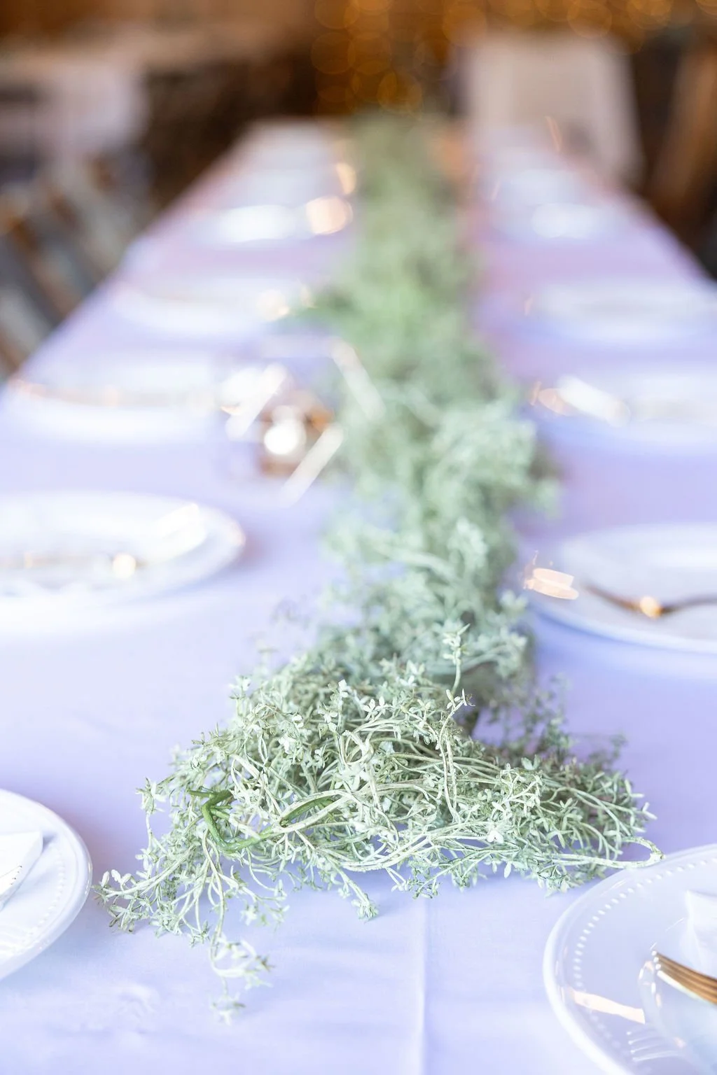 Simple borrowed table greenery at Country Coach House in Burlington, IL.
