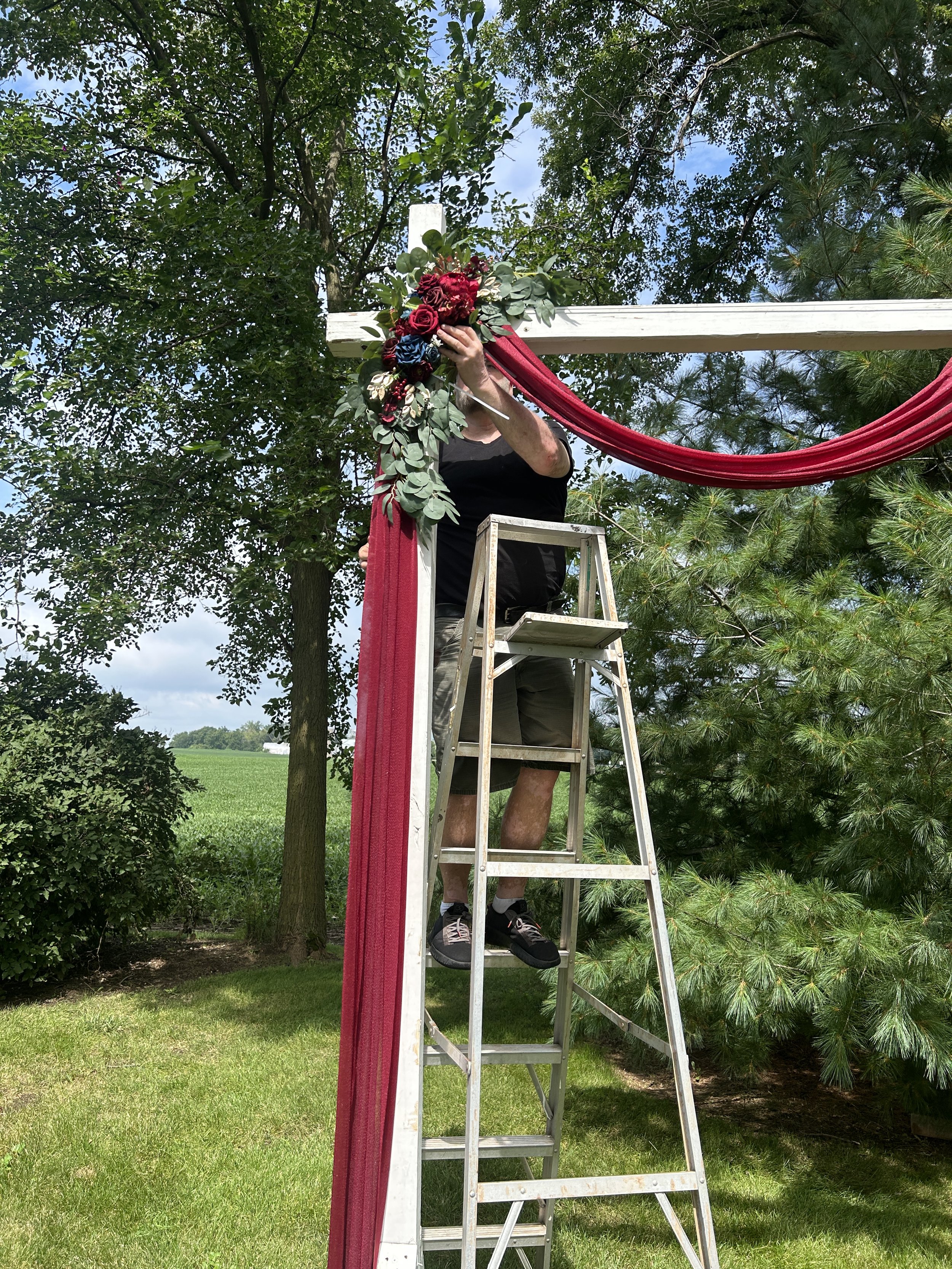 Bruce is decorating the wedding arbor at Country Coach House, Burlington, IL Country Coach House photo