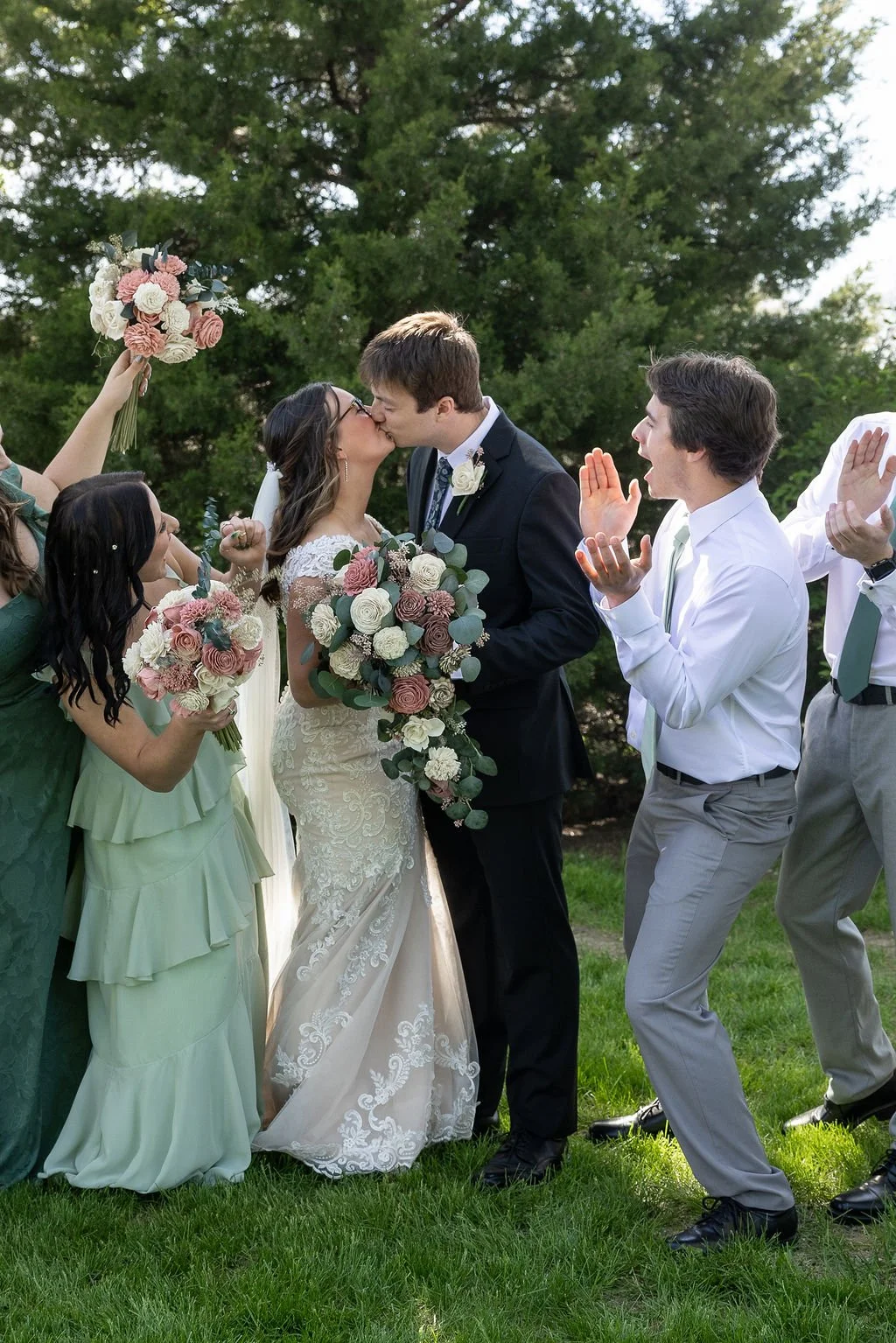 Couple and wedding party at Country Coach House wedding venue in Burlington, IL 