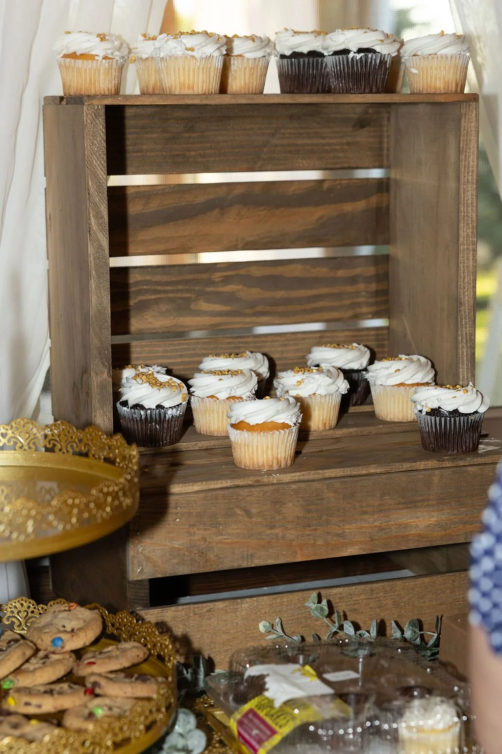 Cupcake and cookie dessert display. 