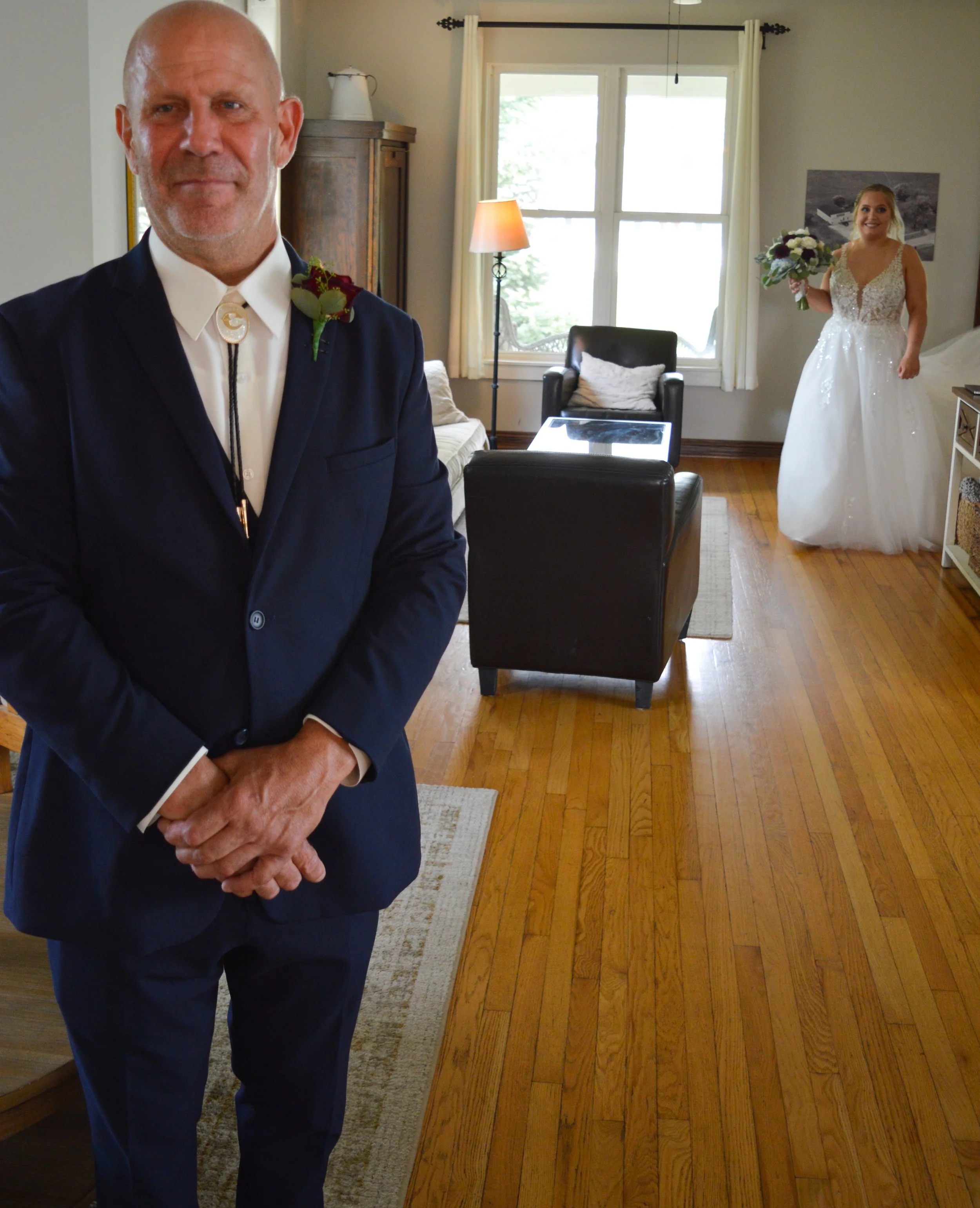 The father is waiting for his first look at the bride.  Country Coach House, Burlington, IL.  Ryan Latimer Photography