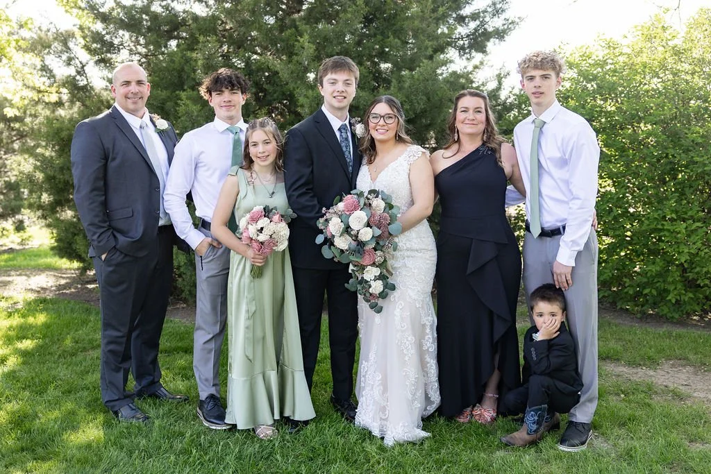 Family photo at Country Coach House wedding venue in Burlington, IL.