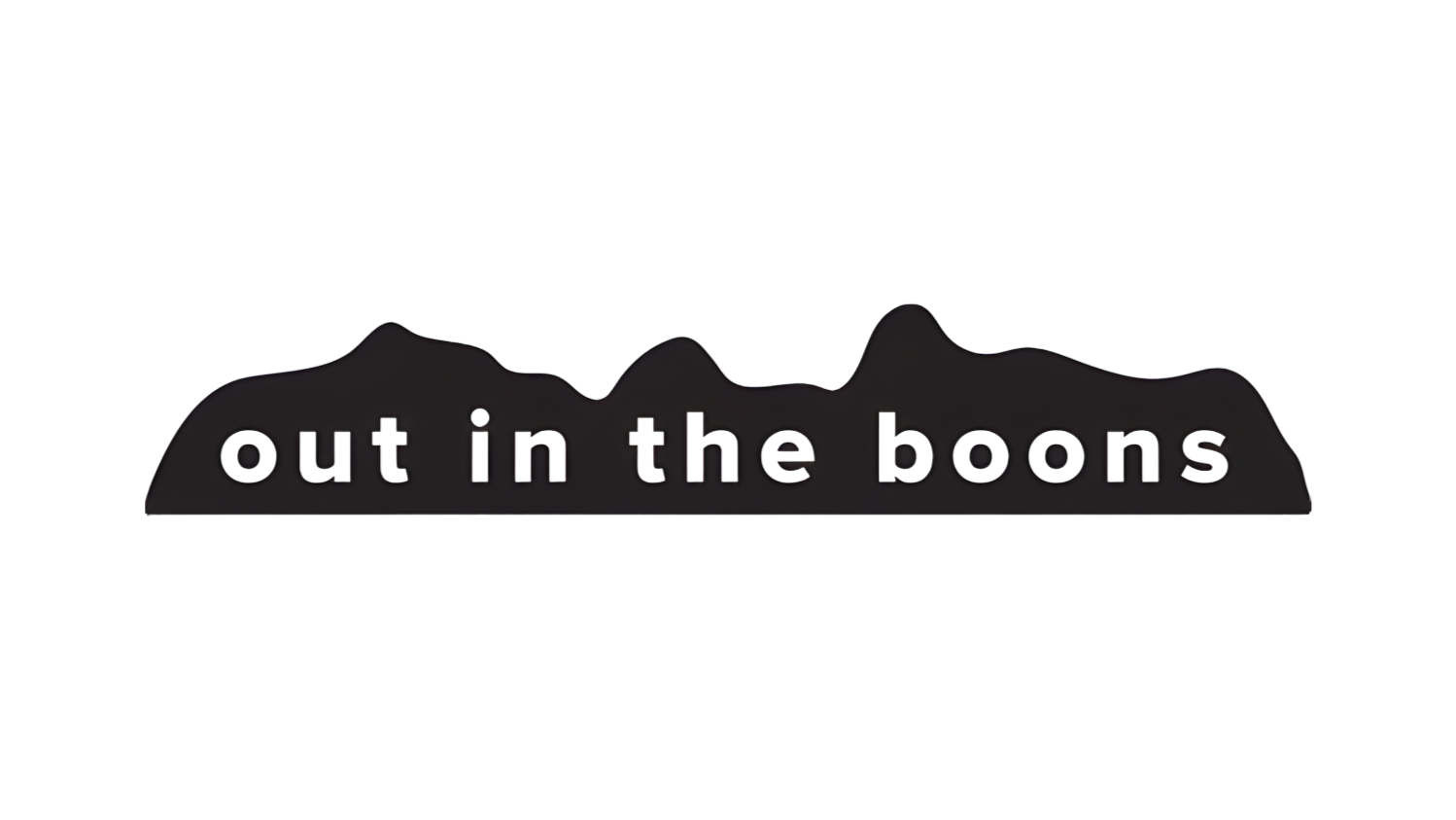 Silhouette of mountain range with the text 'out in the boons' underneath.
