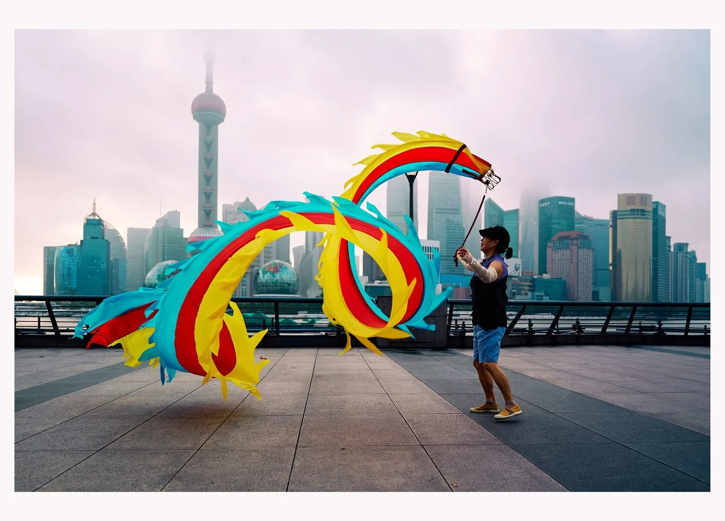 Early morning the Bund in Shanghai. Dragon dancing! Had a fantastic two weeks exploring with my little camera. Loads more to come.  #street #shanghai #china #leica #landscape
