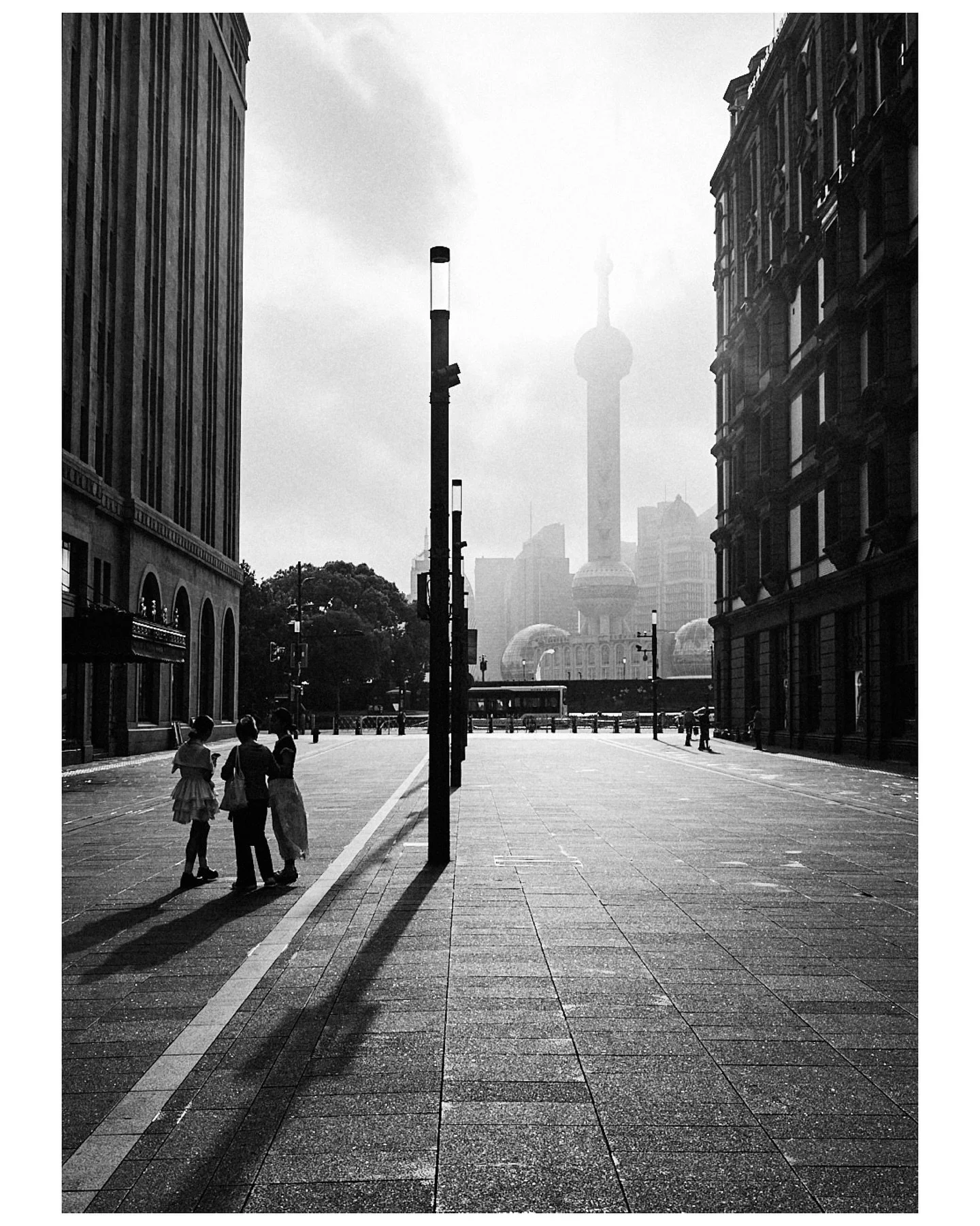 Loved exploring China through the lens of my 28mm Leica Q3. And stripping out the color sometimes revels the texture and emotion. China really is lost in Contrasts in a beautiful way. Ancient meets modern life. Light shadow magic. #China #blackandwhi