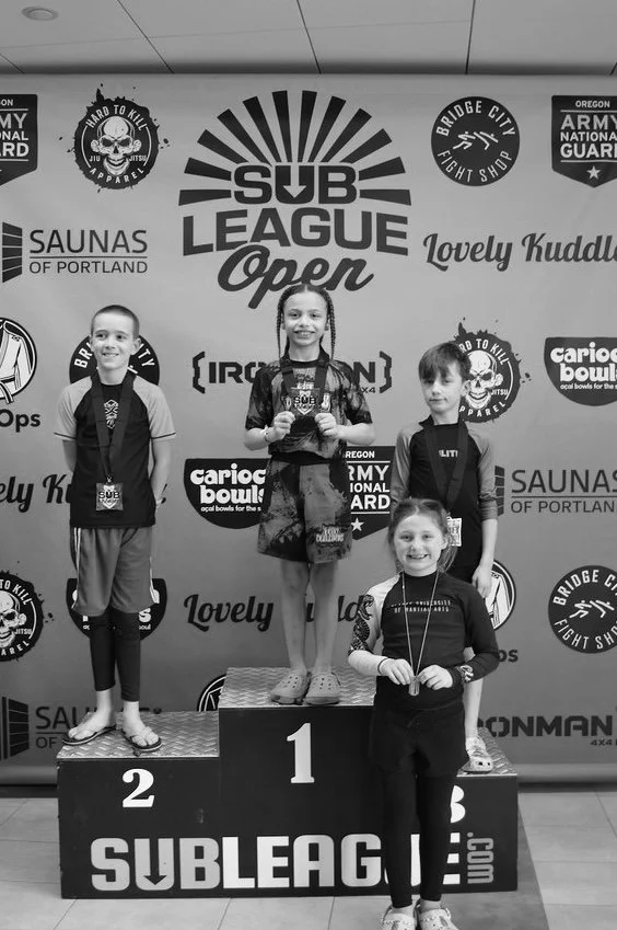 Kids Brazilian jiu jitsu team member placing first at the 2026 Sub League Open in a no gi division