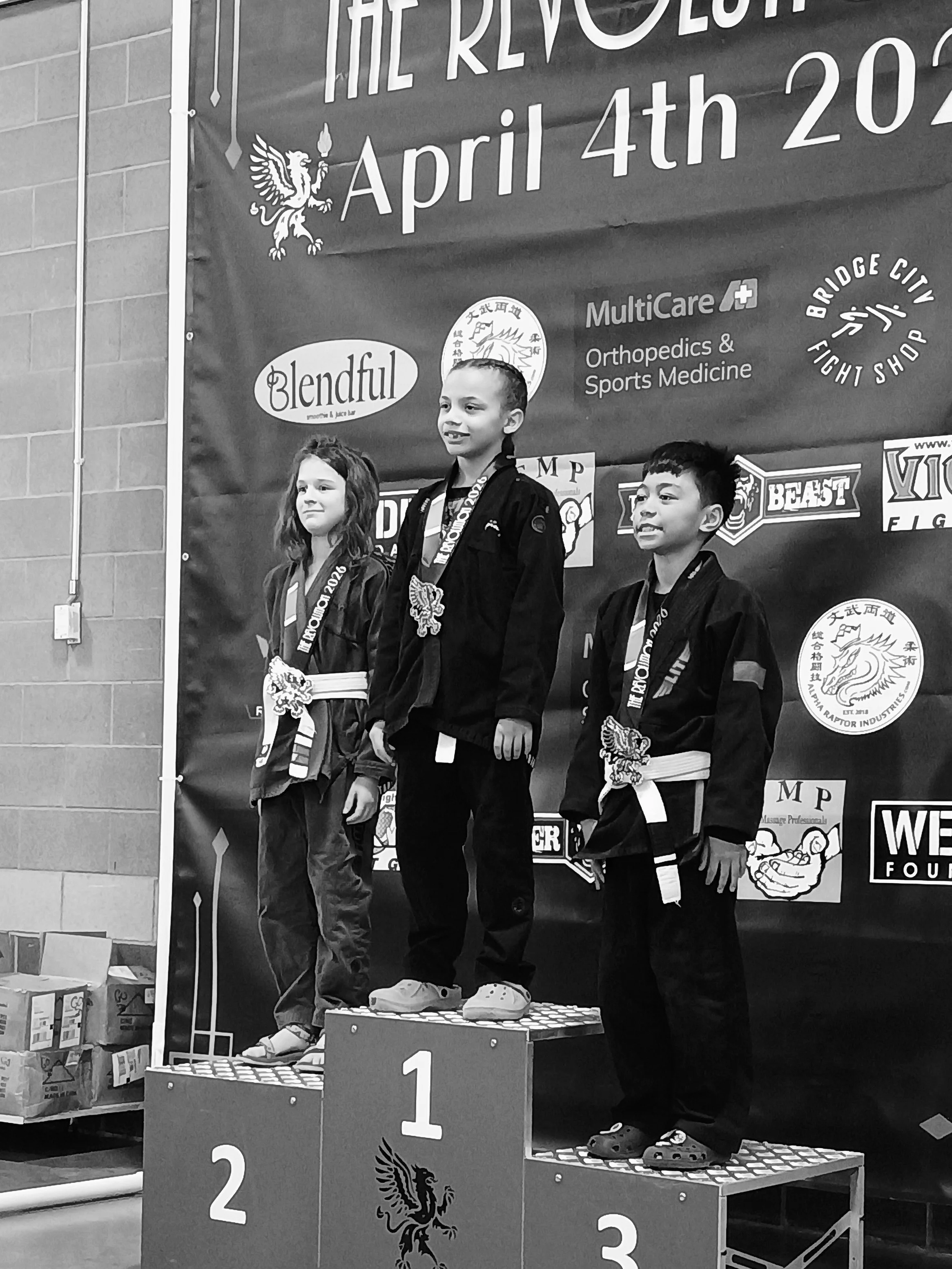 Youth BJJ team member placing first in his GI bracket at the Revolution BJJ competition in Washington