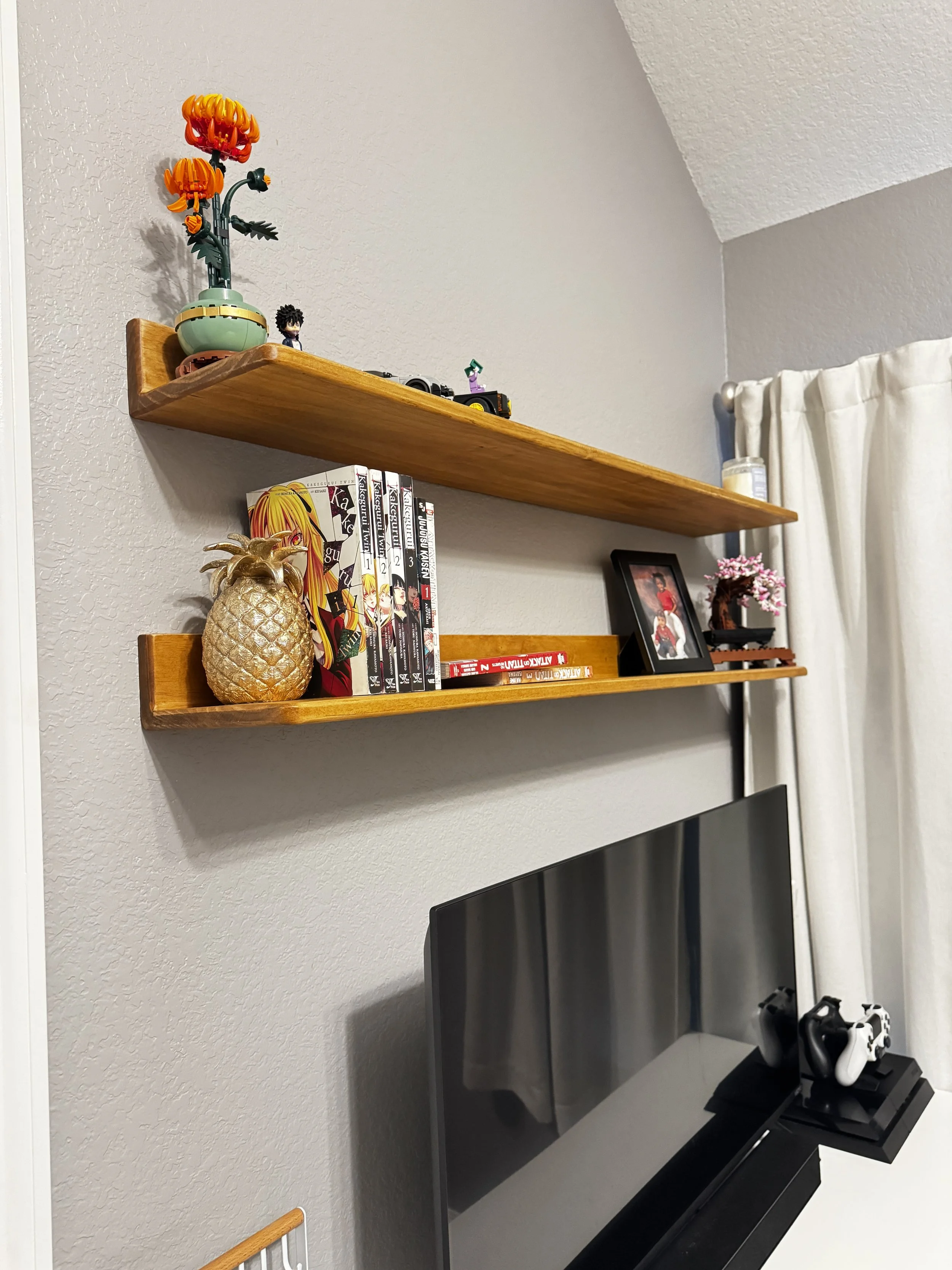 Floating Shelves. Made for Brianna to display her legos and favorite books.