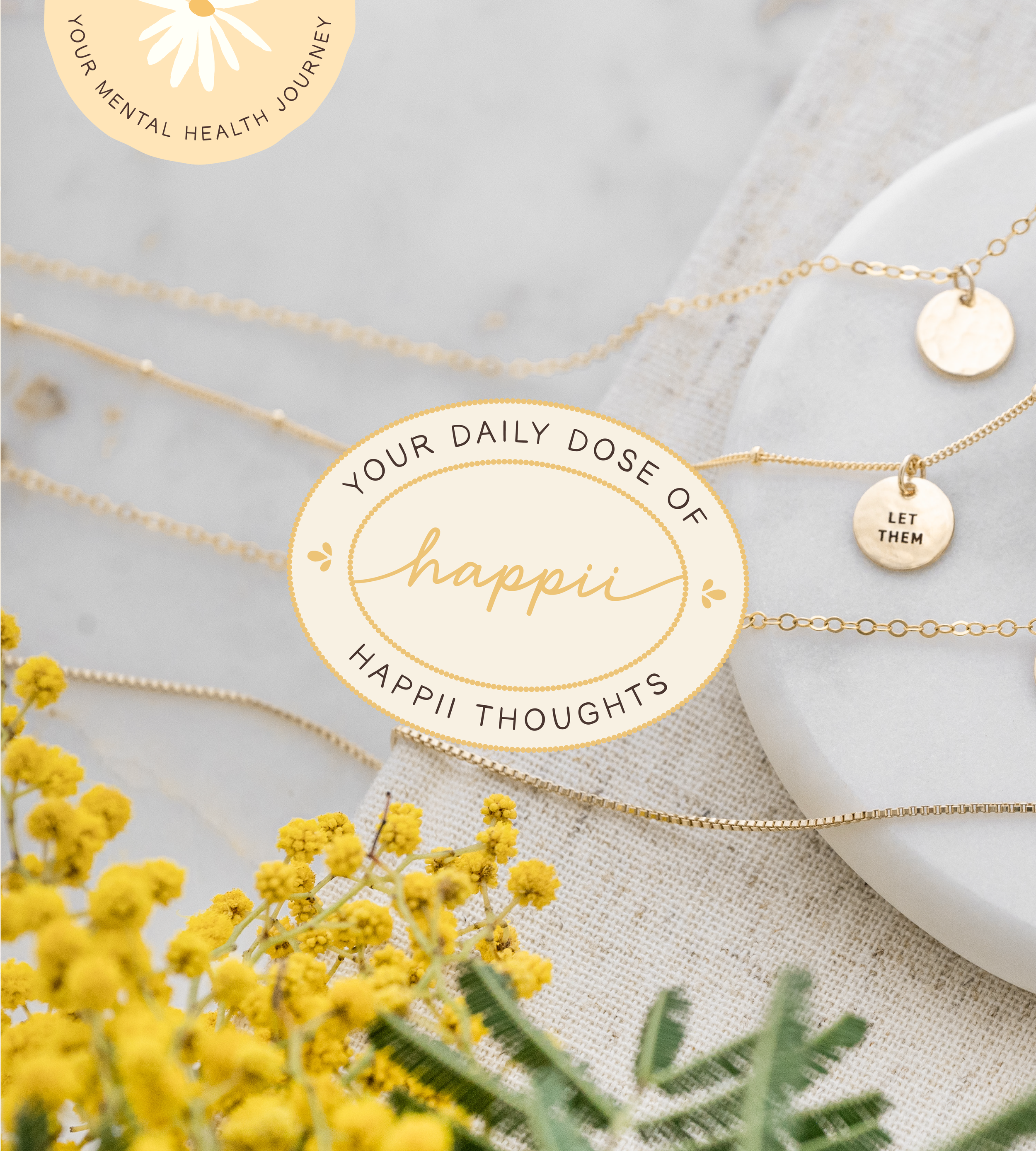 A flat lay photograph of several gold necklaces with round pendants placed on a light-colored surface. The image features a circular label with the text "Your daily dose of happiness, happy thoughts" and delicate yellow flowers in the foreground.