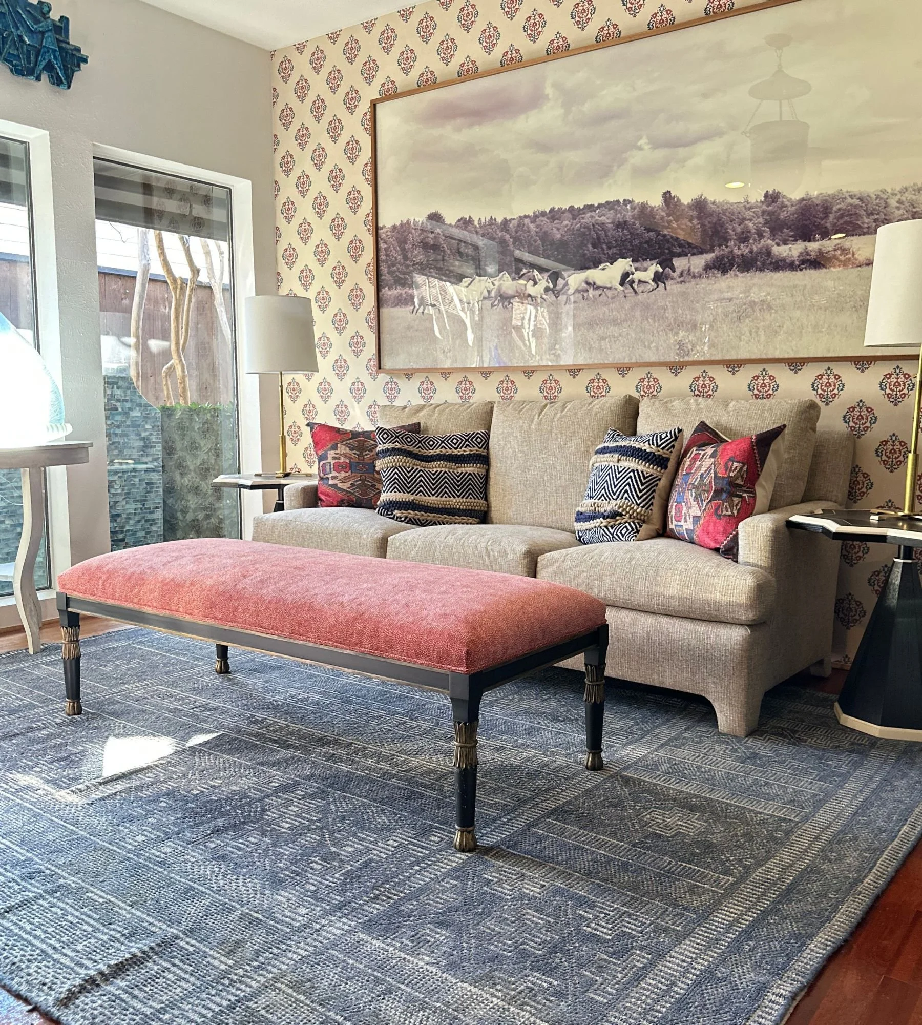 full-service-interior-designer-dallas-tx-scale-and-proportion-in-design-living-room-with-patterned-wallpaper-sofa-and-pink-upholstered-ottoman.jpg