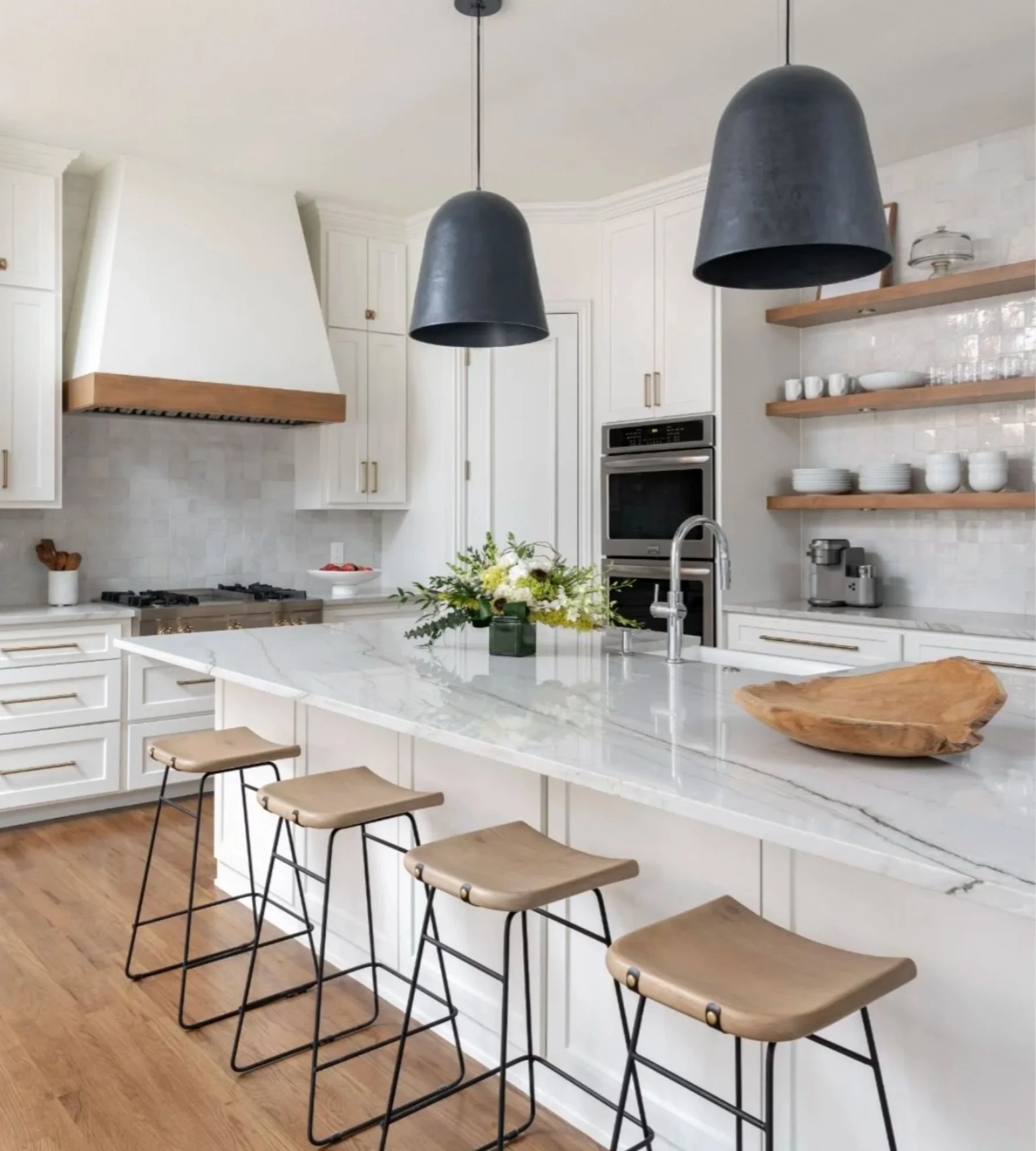 adrienne-morgan-interior-design-fort-worth-tx-wood-accents-in-home-design-luxury-kitchen-white-cabinets-wood-open-shelves-black-pendants-beauty-remodel.jpg
