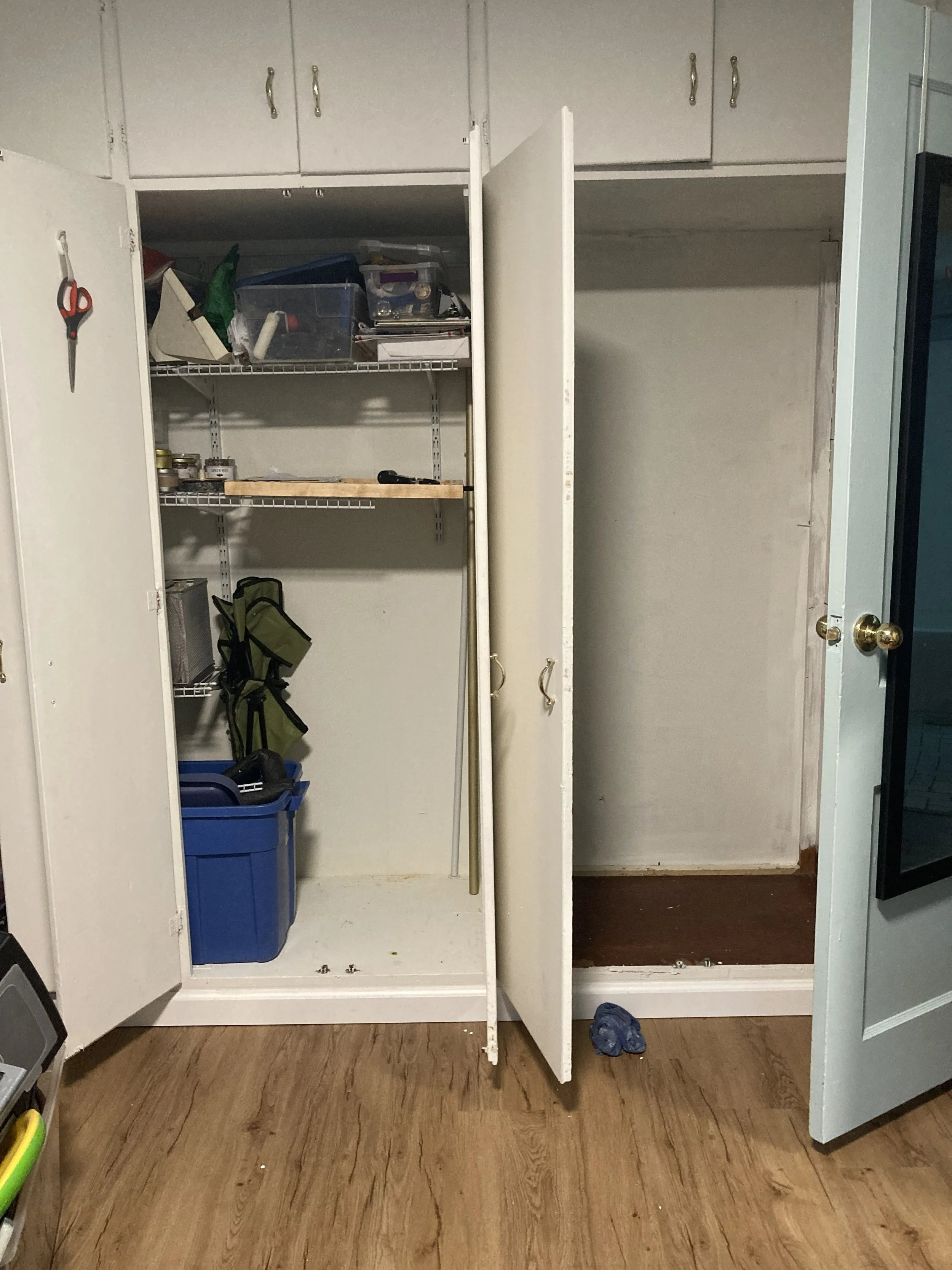 This is an after photo of a bedroom closet. This was the last part of the condo to get cleaned, painted, and restructured after the renovations. Wire shelved were installed for a durable, clean, modular, and light look.