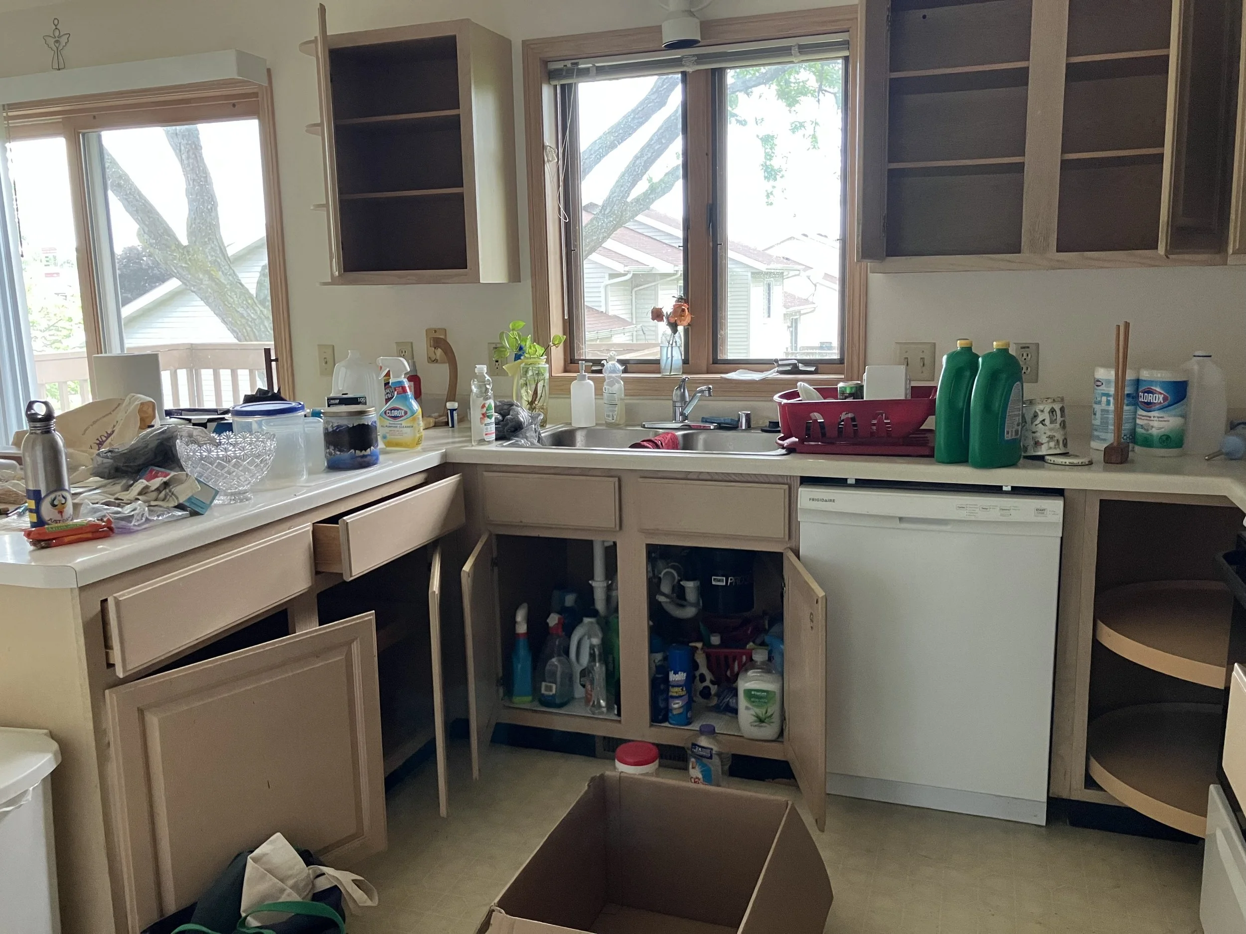 After 20 years in this place, these two had found a smaller home for retirement After all the furniture was moved and before the professional cleaners arrived, we did a deep clean and organize of the kitchen. This is a “During” photo!