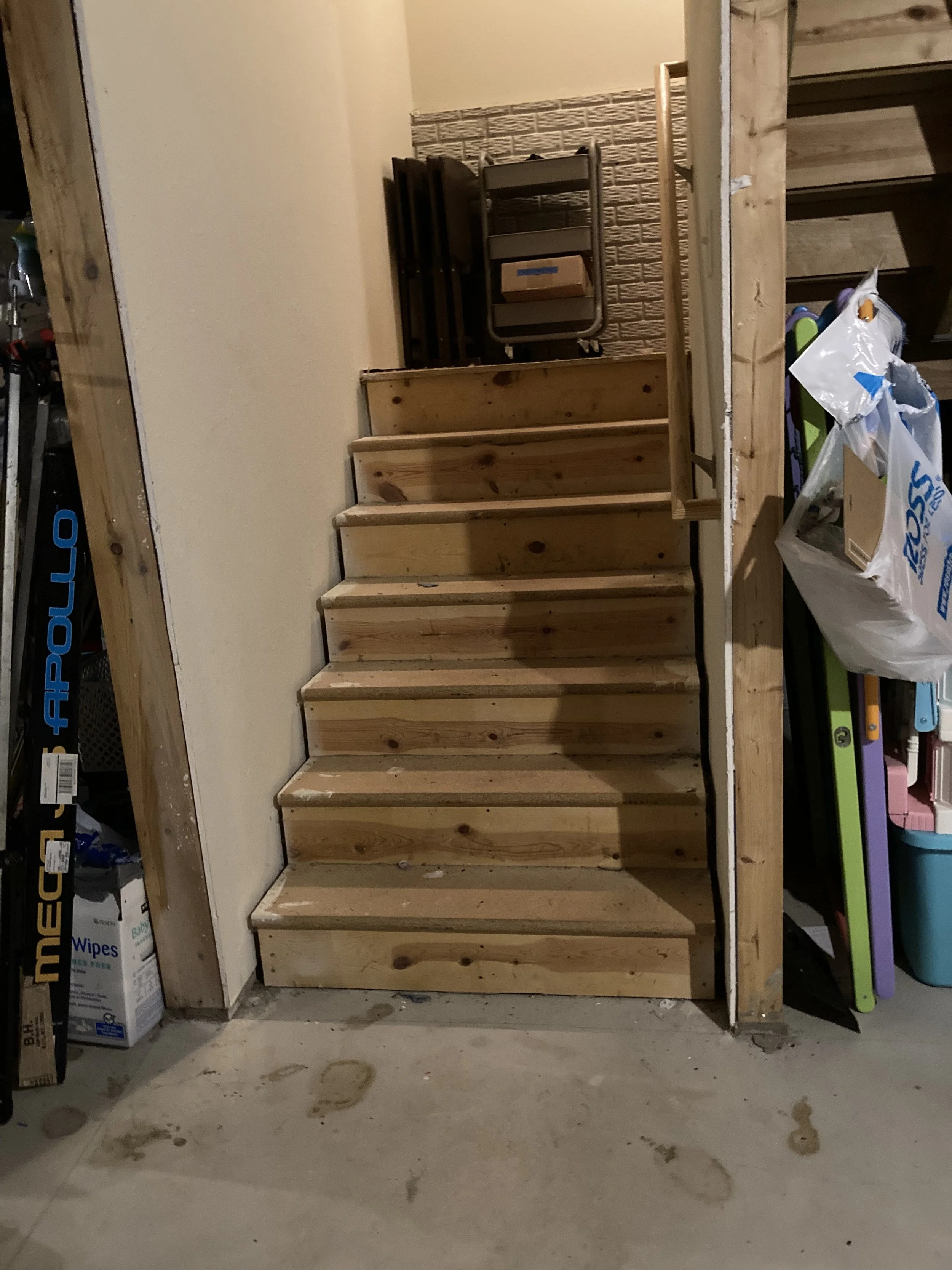 After photo of basement stairs.