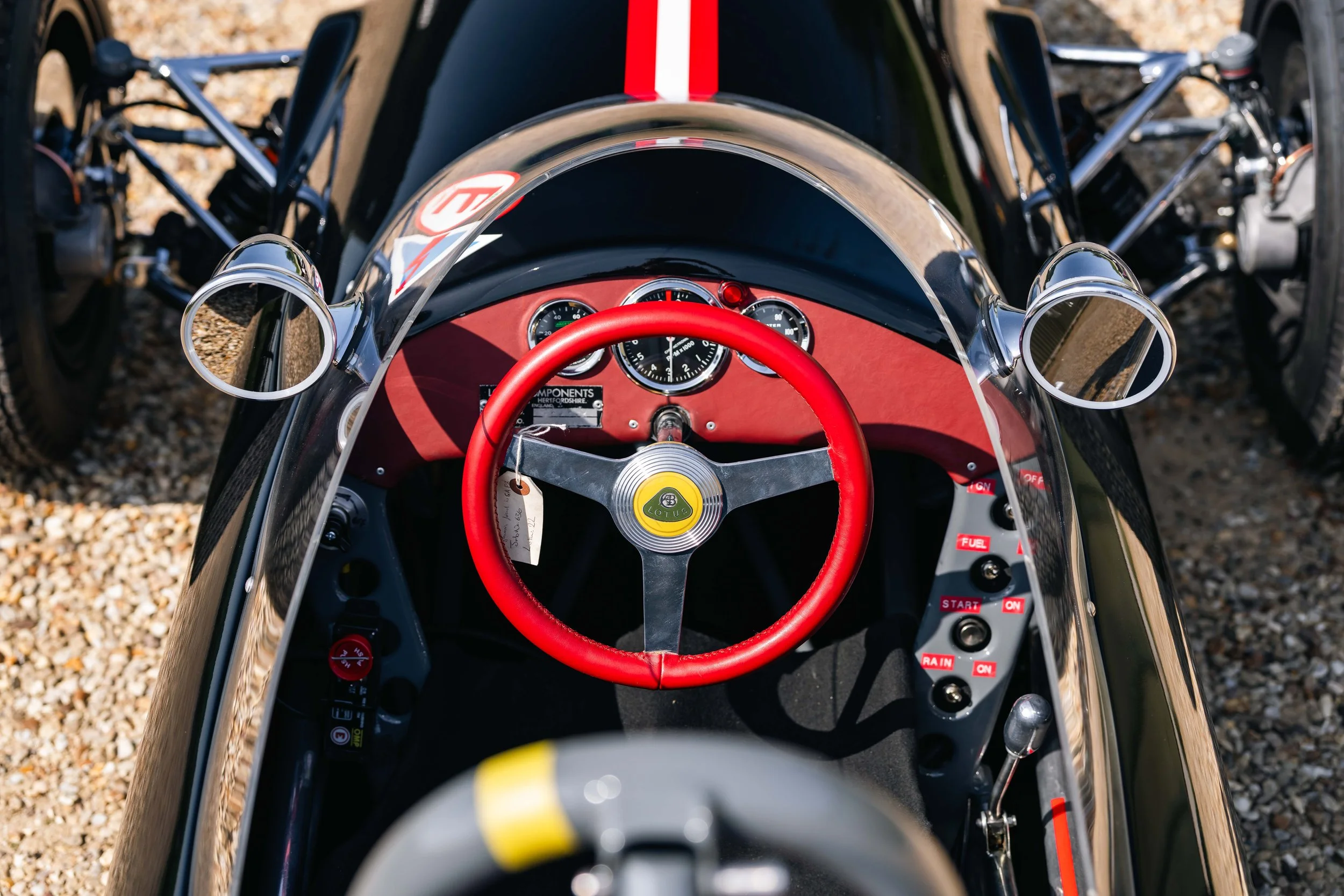 Lotus 22 Formula Junior – cockpit detail, chassis 22-J-39, red steering wheel, instrumentation and roll hoop