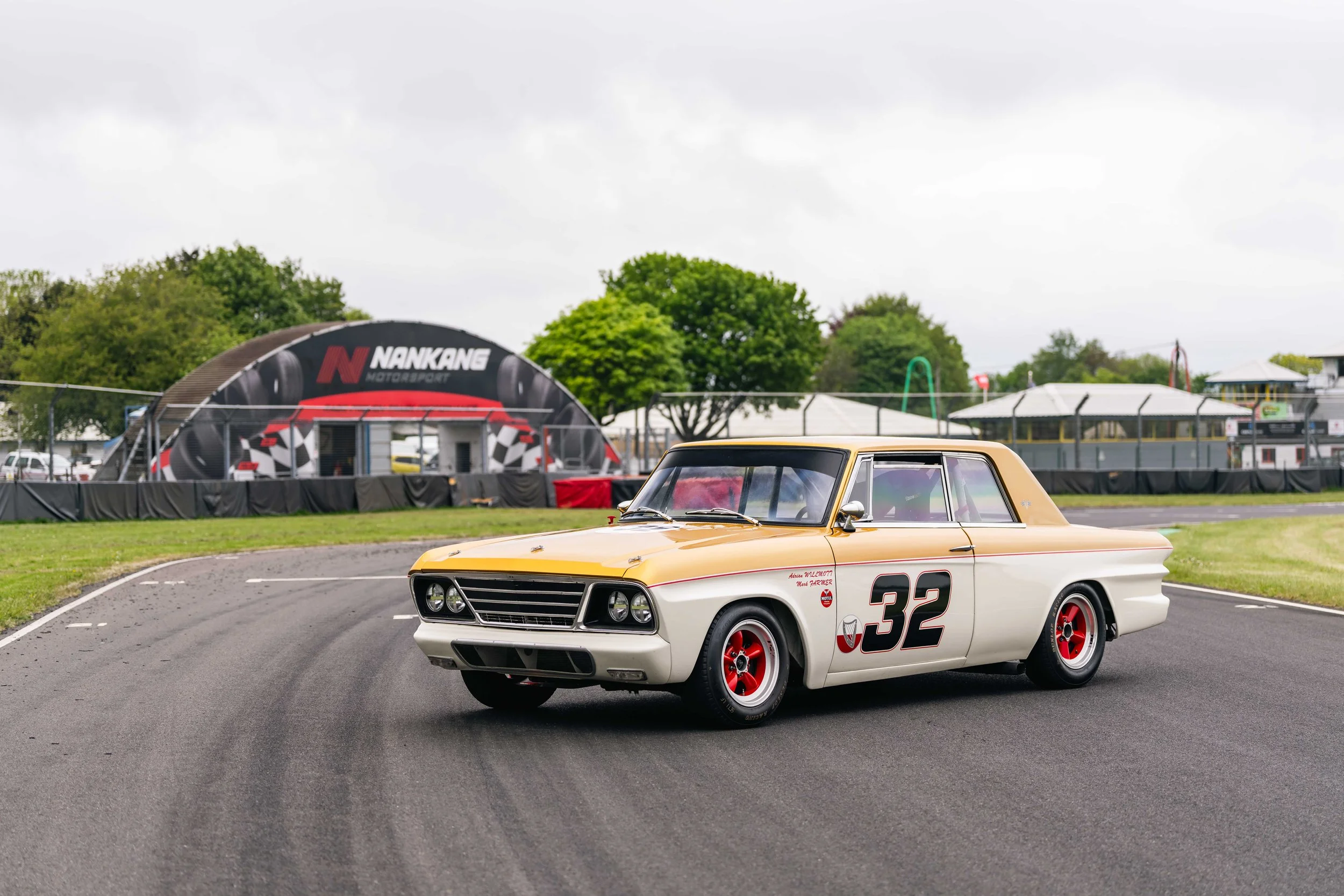 Studebaker Lark Daytona historic touring car. Goodwood. Jordan Racing Team prepared. left side on circuit.