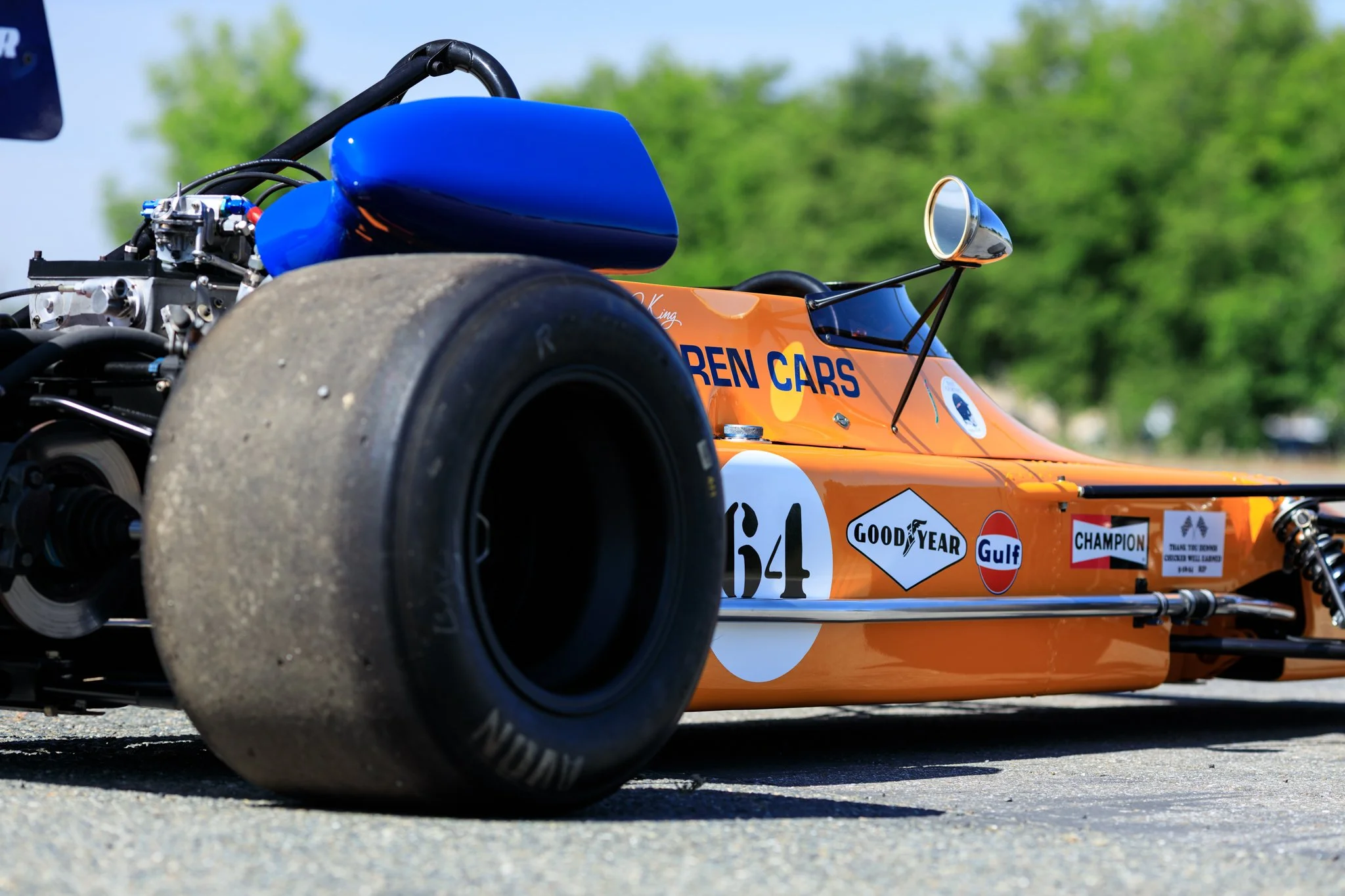 McLaren M21 Formula 2, chassis M21-3 — right side rear three-quarter view, race number 64, Goodyear rear tyre, Gulf decal, McLaren Cars sidepod
