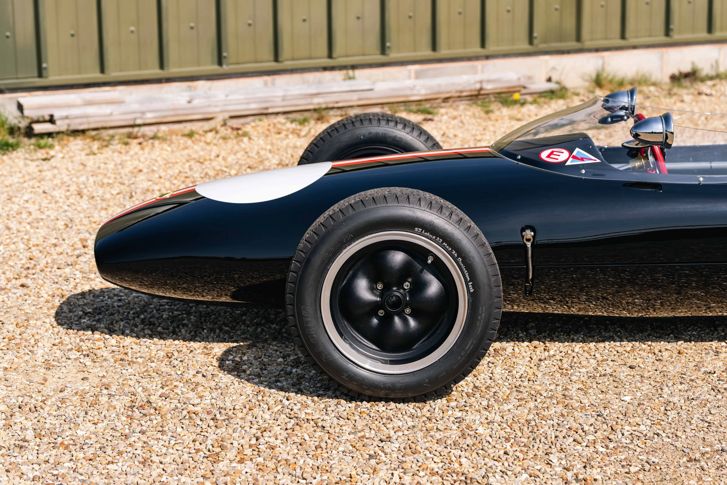 Lotus 22 Formula Junior – left side front wheel and nose, chassis 22-J-39, black livery with Austrian stripes