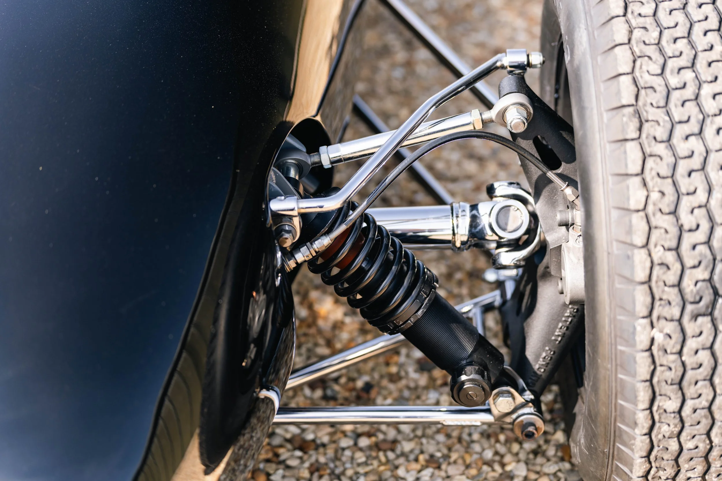 Lotus 22 Formula Junior – left side front suspension detail, chassis 22-J-39, coilover damper and wishbone