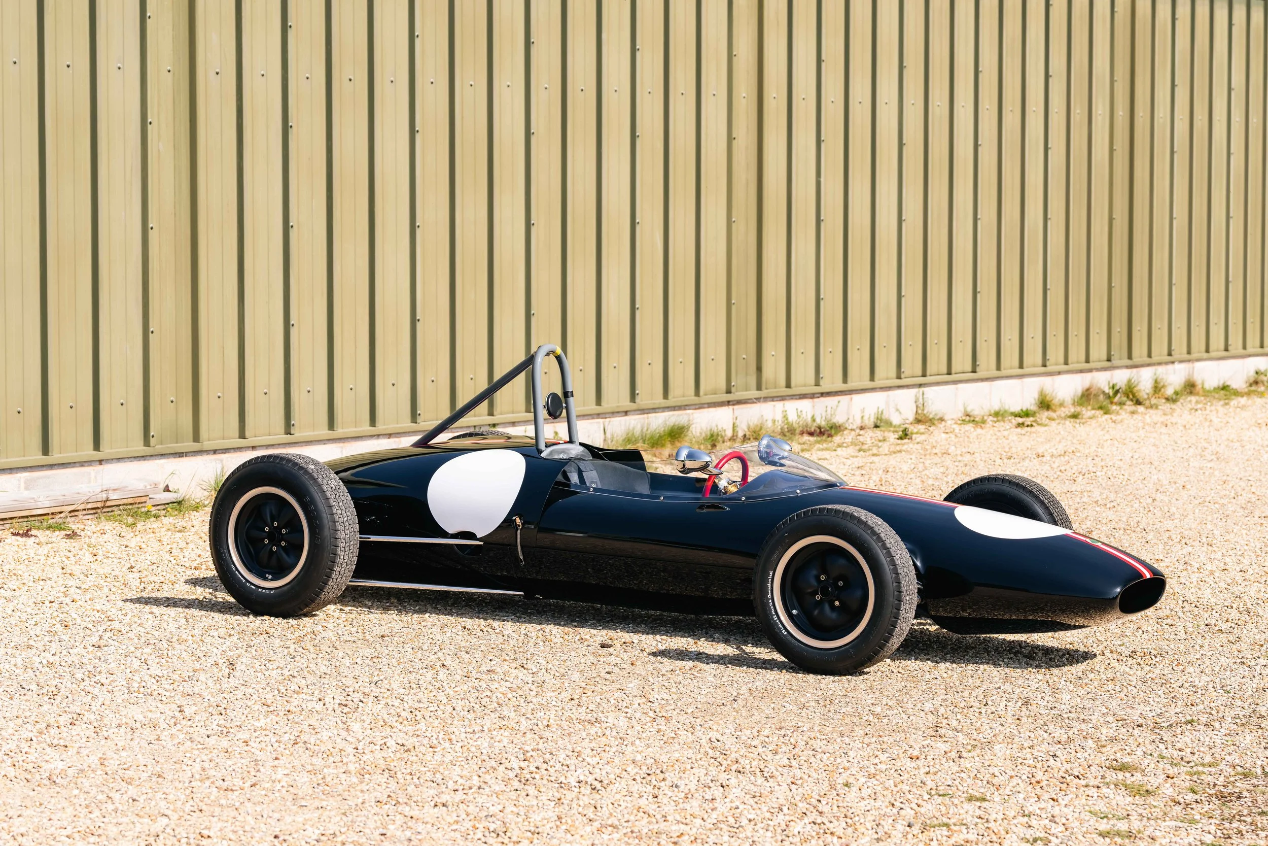 Lotus 22 Formula Junior – right three-quarter, chassis 22-J-39, black livery with Austrian stripes