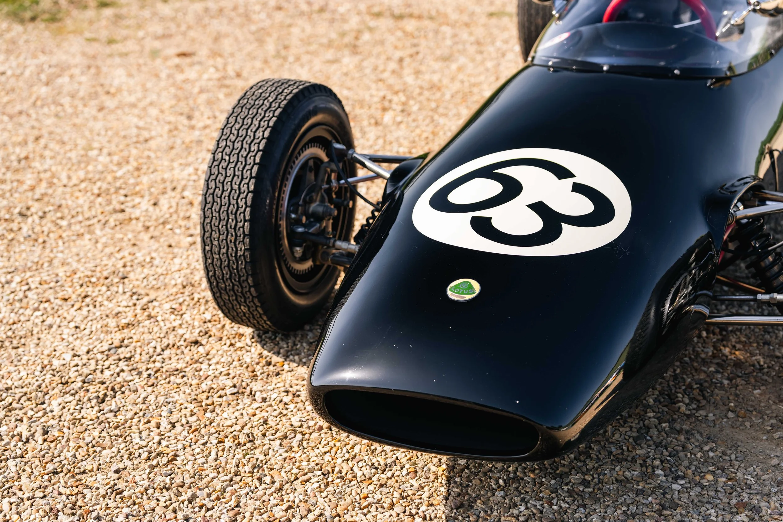 Lotus 20 Formula Junior – nearside nose detail, chassis 20-J-905, race number 63, black livery, Lotus badge