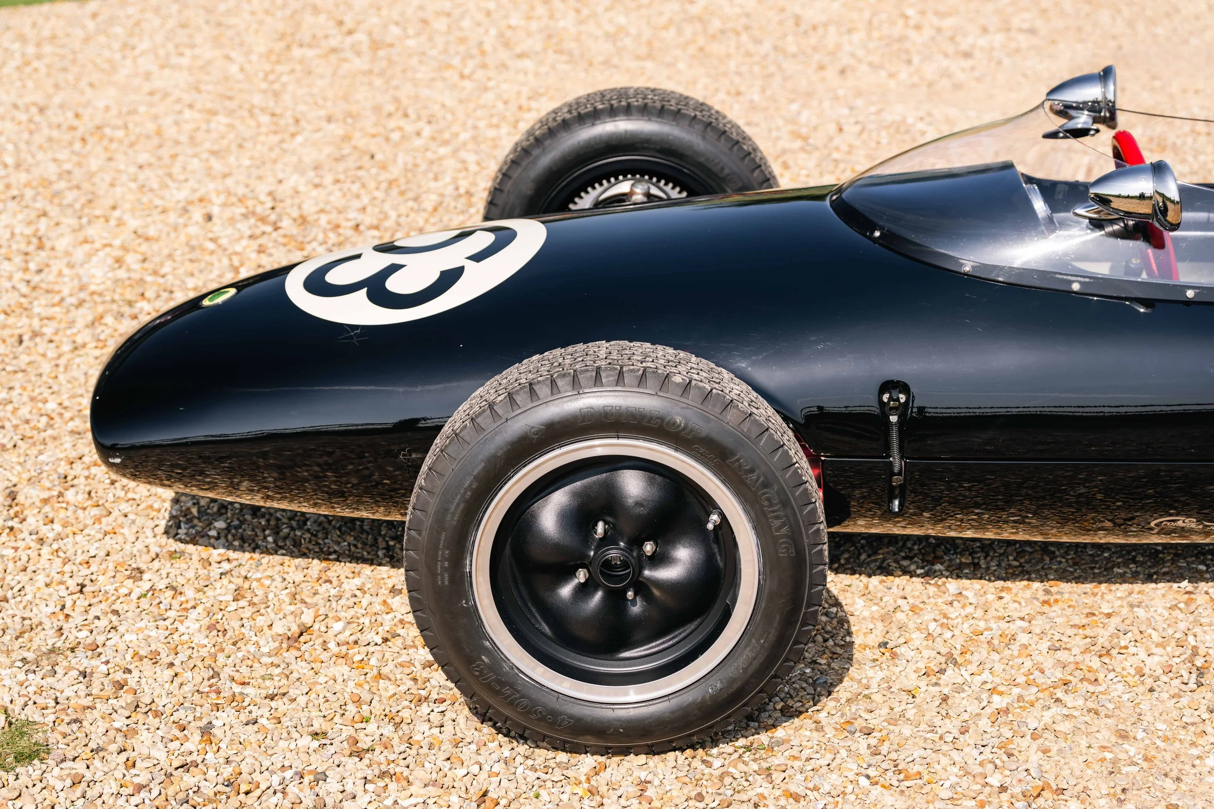 Lotus 20 Formula Junior – offside profile, chassis 20-J-905, black livery, race number 63