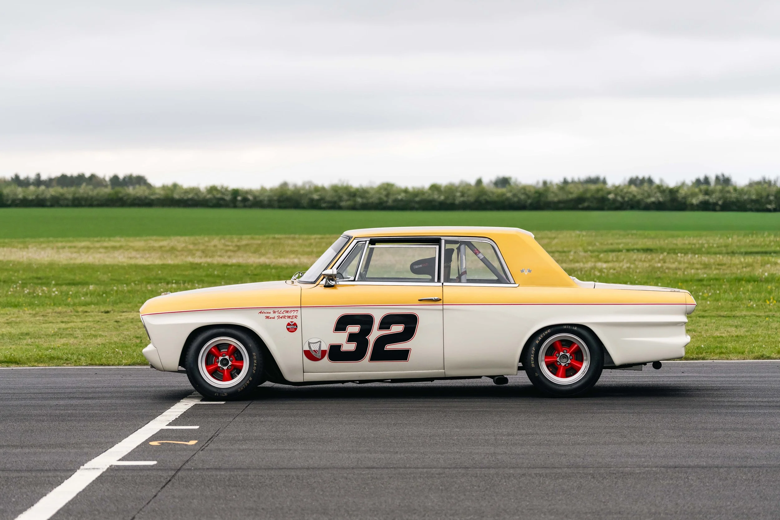 Studebaker Lark Daytona historic touring car. Goodwood.  Peter Knight Chevrolet V8. left side view.