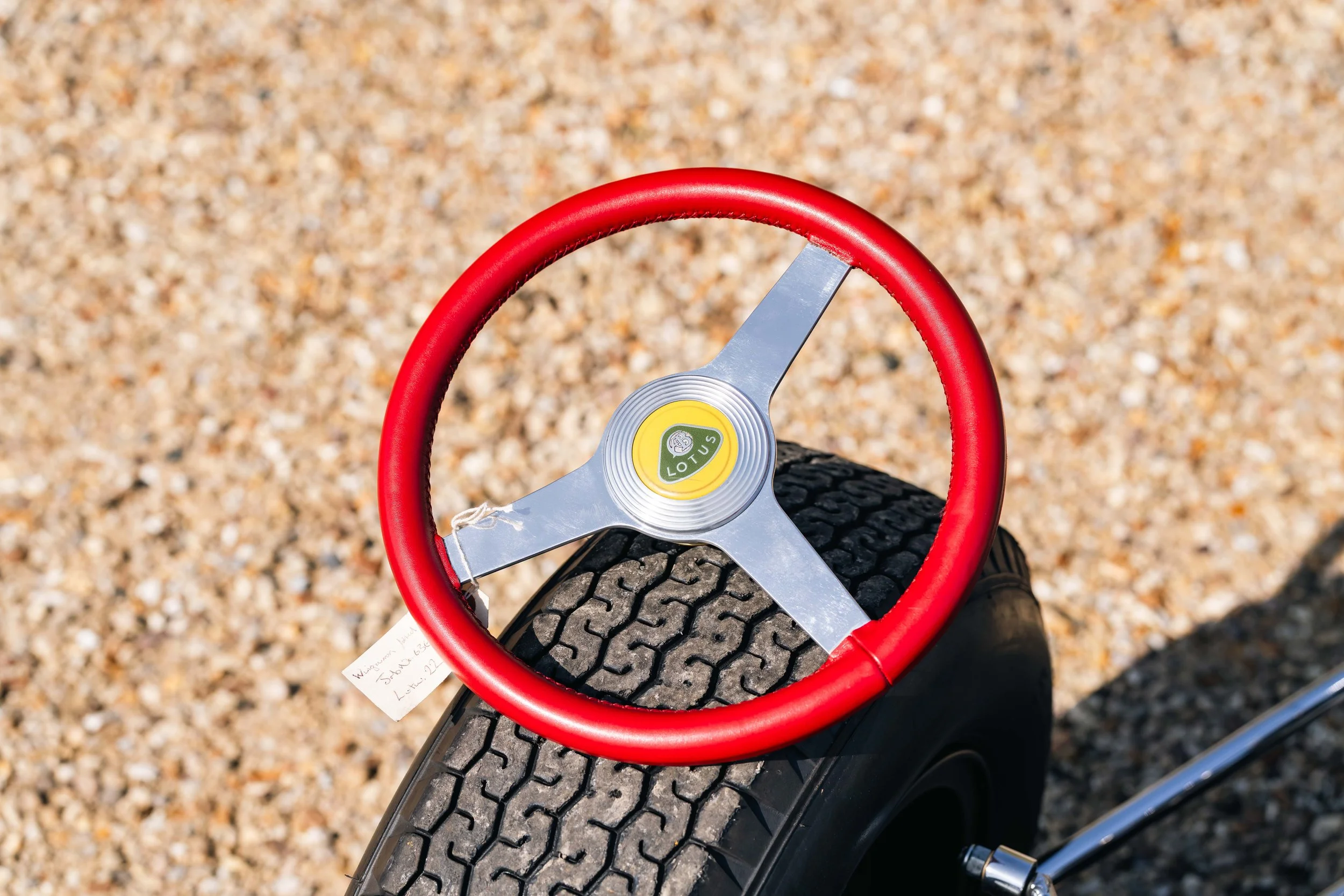 Lotus 22 Formula Junior – red steering wheel with Lotus badge, chassis 22-J-39